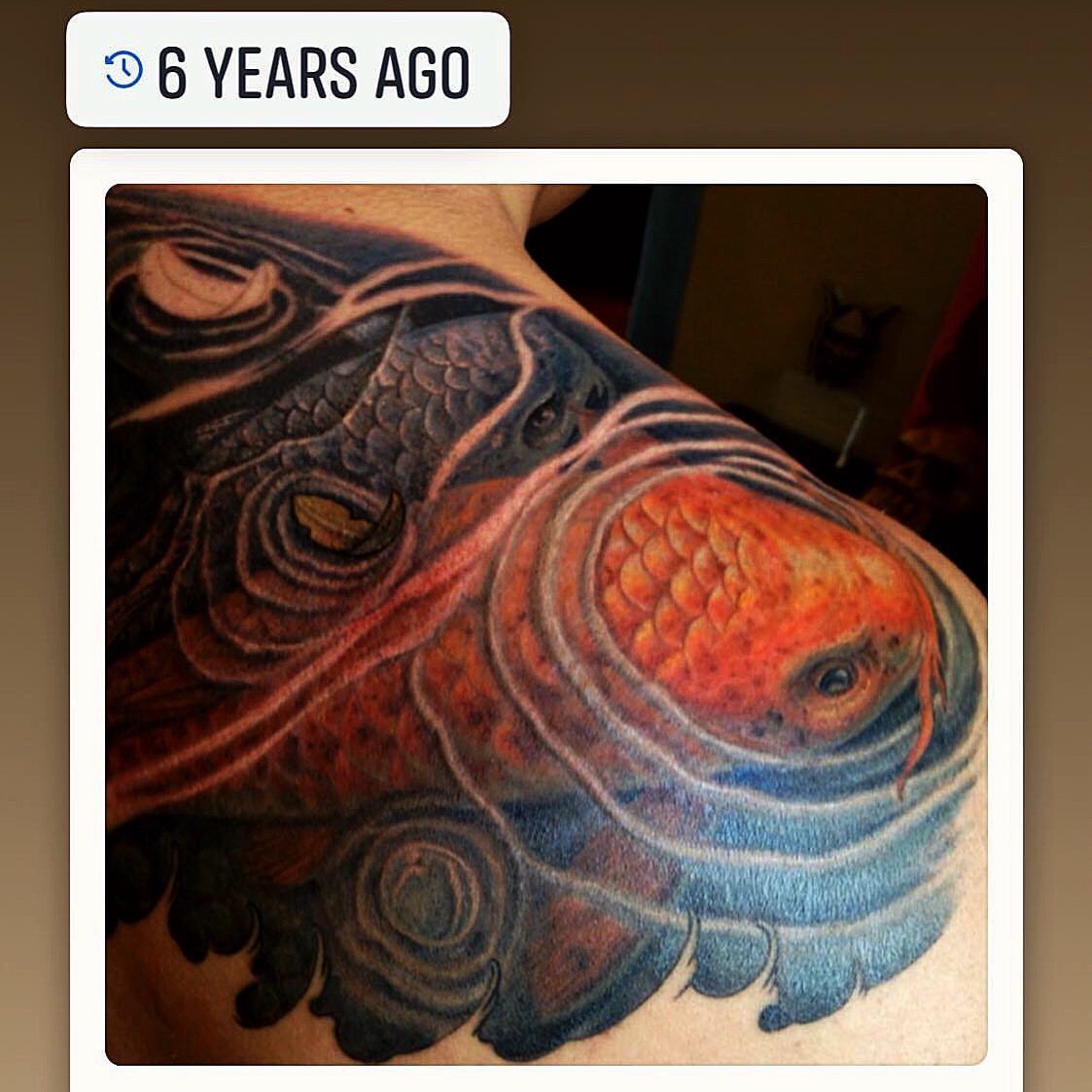 Koi fish realism tattoo on the shoulder by Patrick Delvar