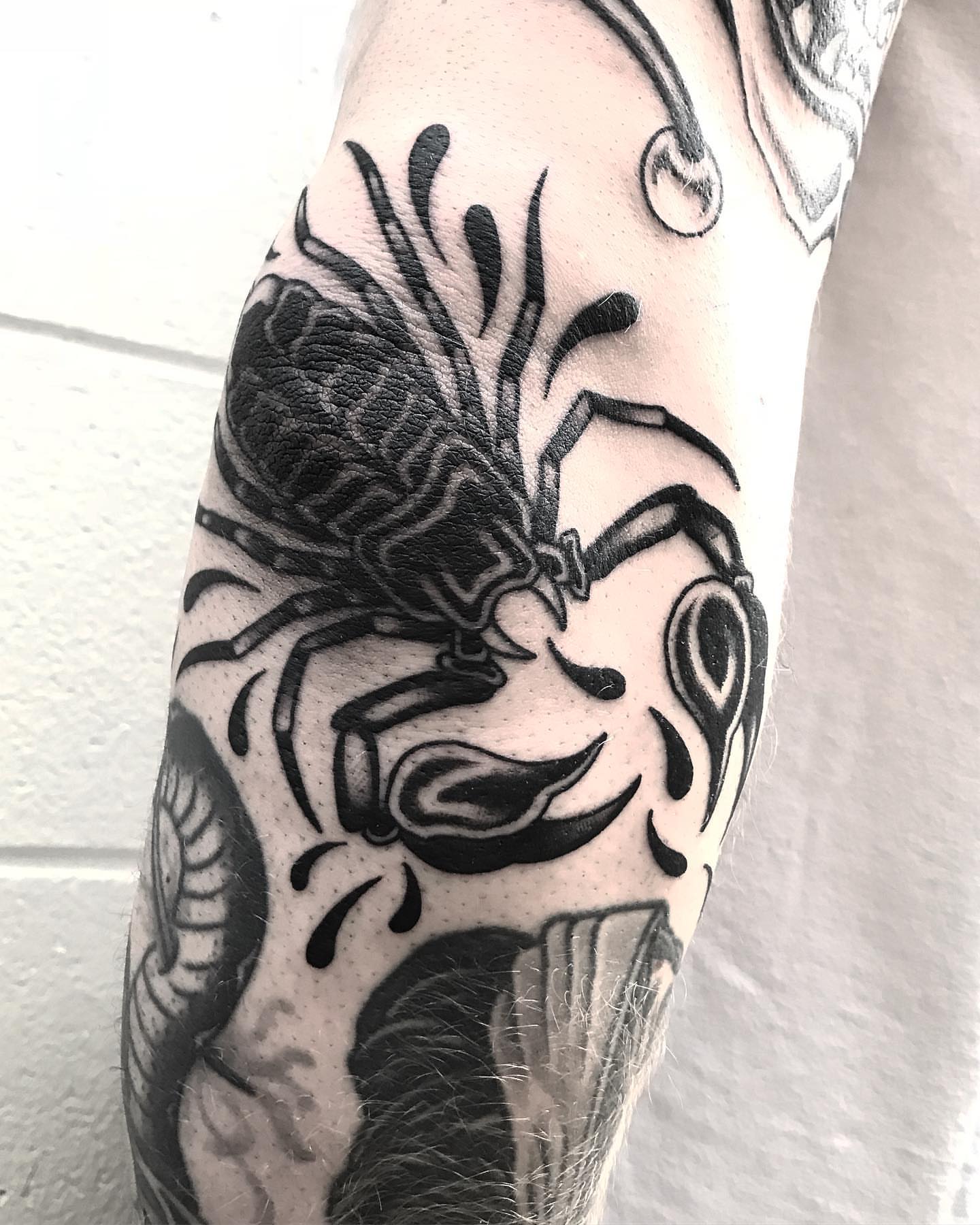 Scorpion black and grey tattoo on the forearm by Jay Breen