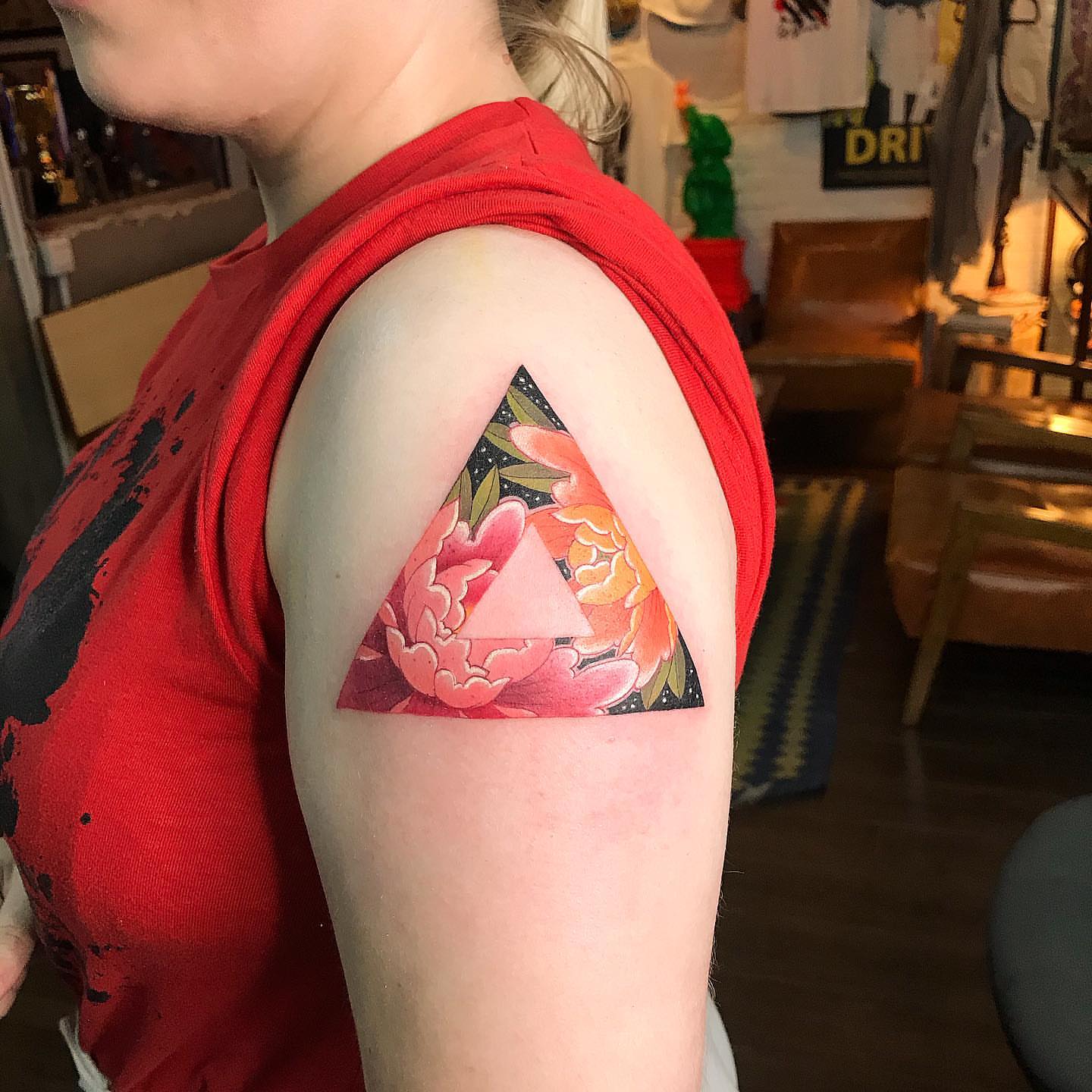 Tattoo by @jenna_tattoo — geometric, watercolor
