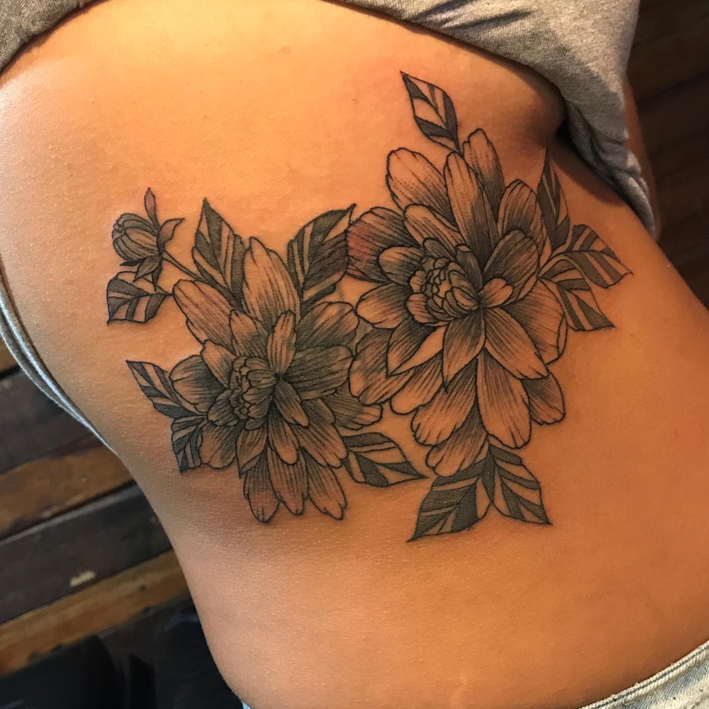 Dahlia flowers black and grey tattoo on the thigh by PrimaTa’ttoo_021