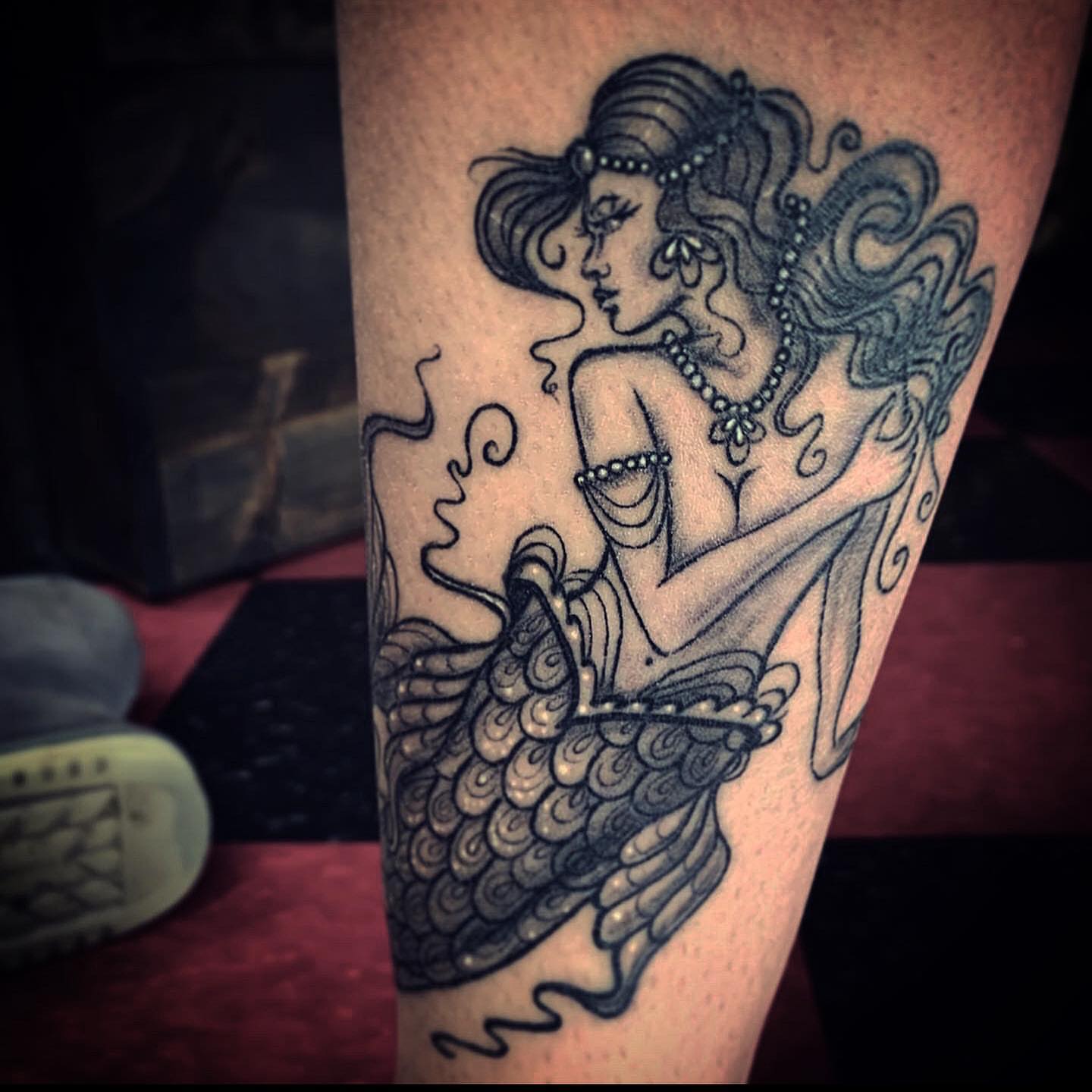Mermaid black and grey tattoo on the forearm by Caitlin Curtis Tattoos & Booking, Dayton, Ohio