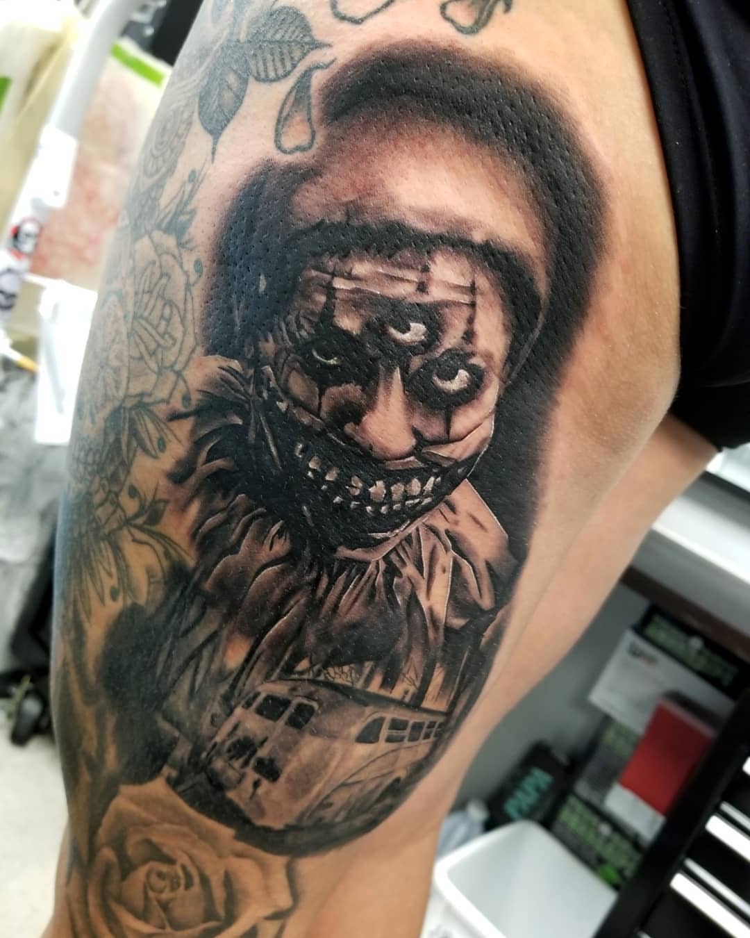 Clown realism tattoo on the forearm by James Foltz