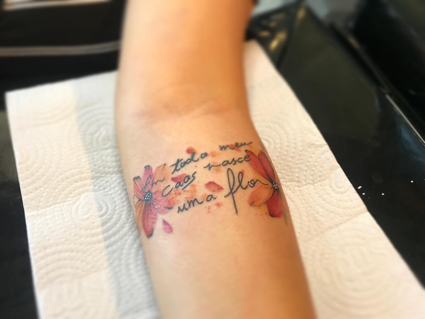 Flower and script watercolor tattoo on the forearm by PrimaTa’ttoo_021