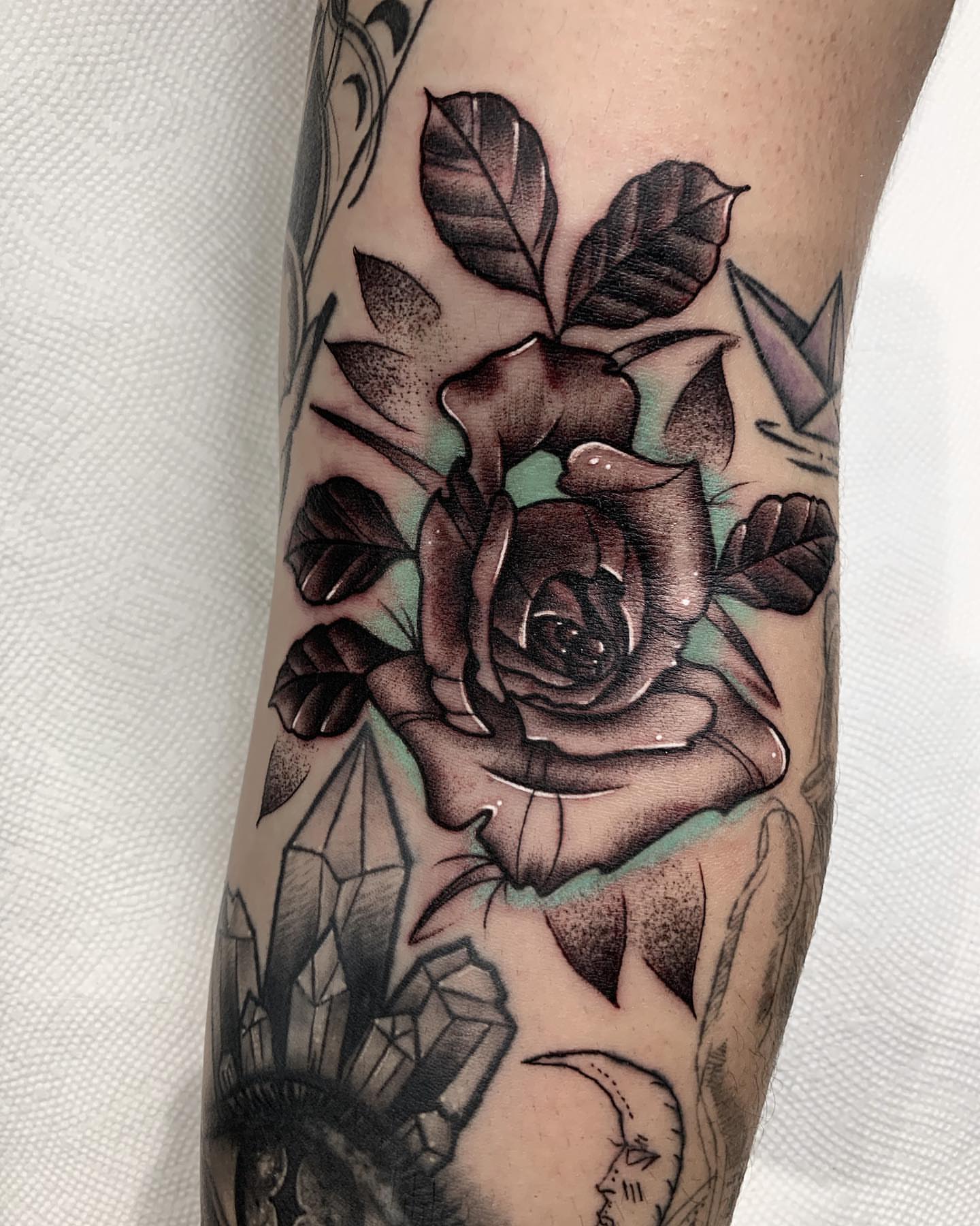 Rose dotwork tattoo on the forearm by E