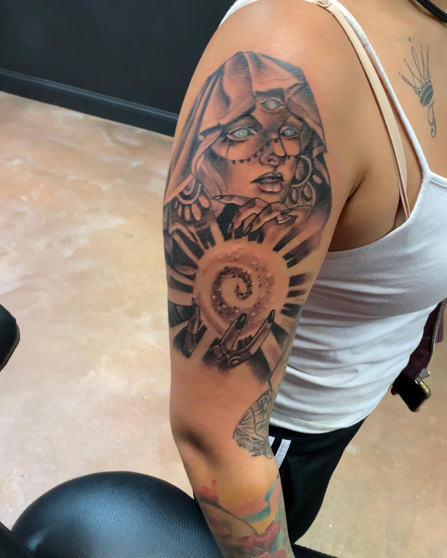 Woman with hood realism tattoo on the forearm by Mikeyftsk2