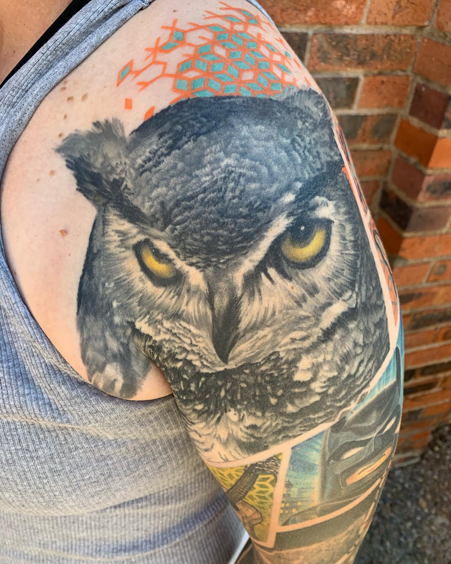 Owl realism tattoo on the shoulder by Ben Viamontes