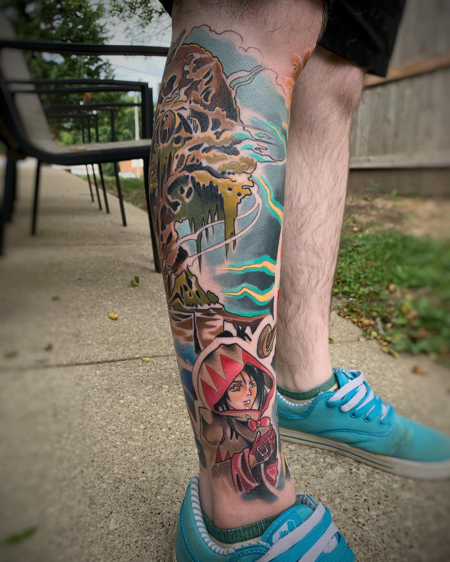 Anime character anime tattoo on the calf by Derek Hutchison, Des Moines, Iowa
