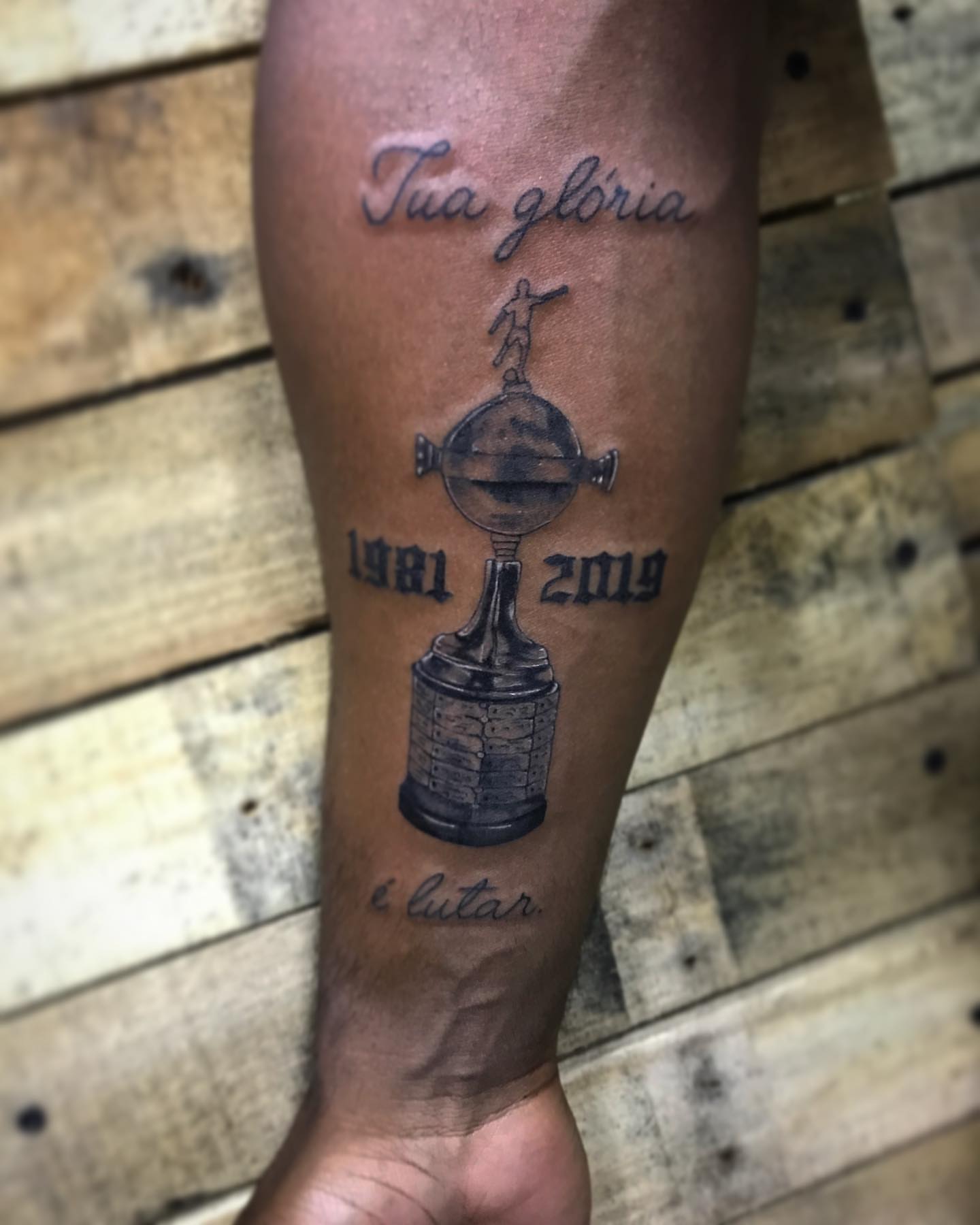Trophy and figure black and grey tattoo on the calf by PrimaTa’ttoo_021