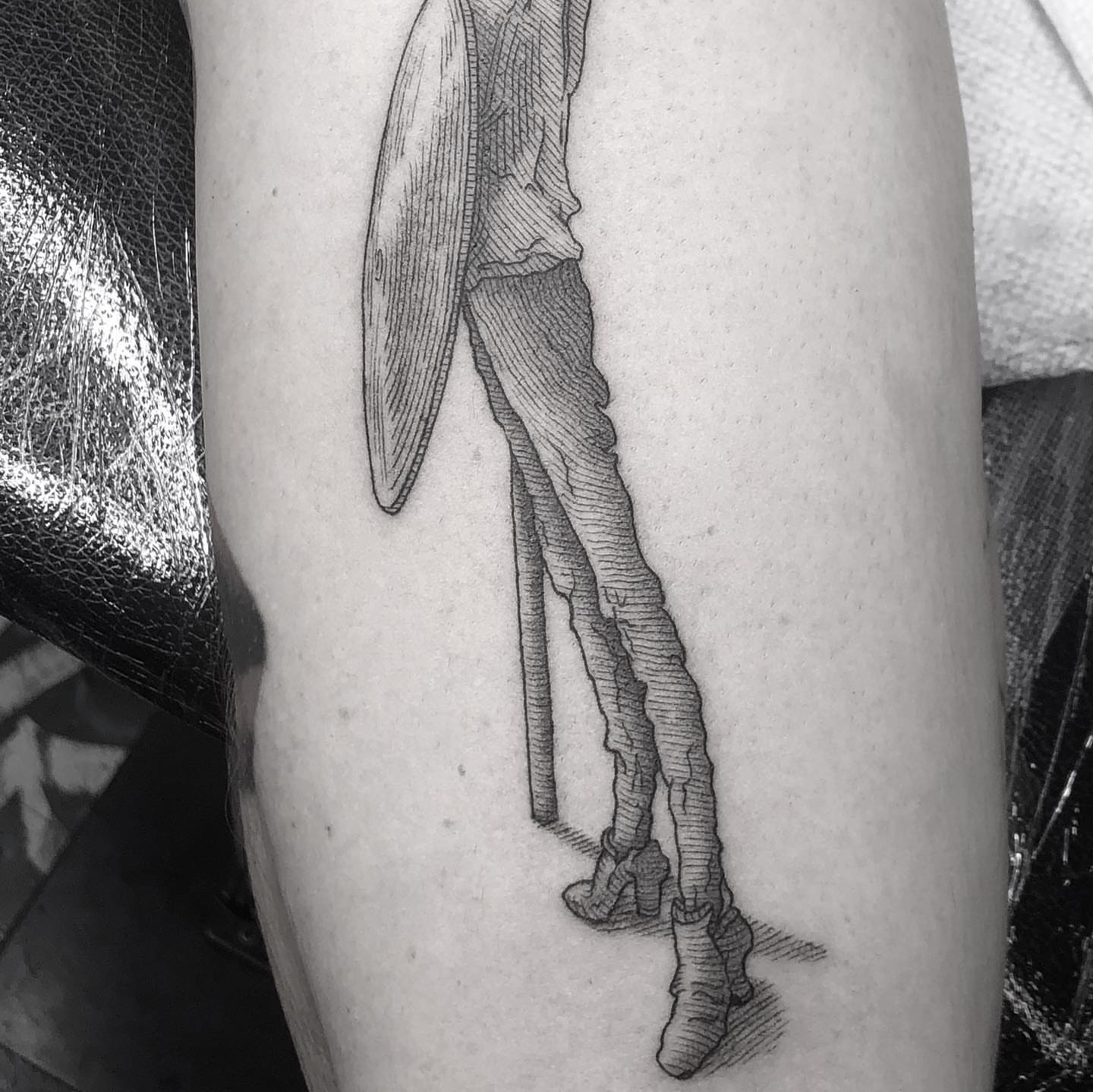 Legs and surfboard dotwork tattoo on the thigh by Jorge Nox