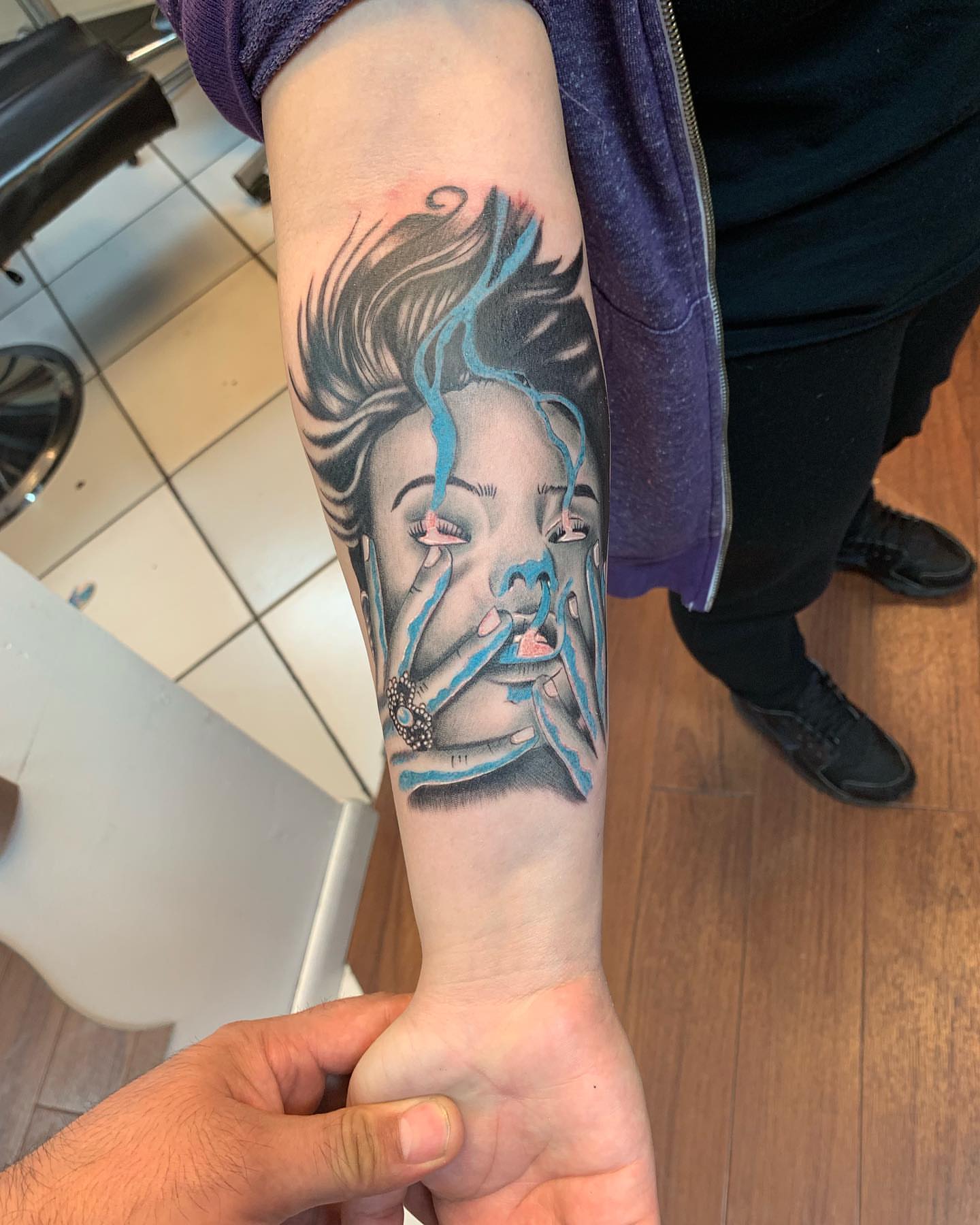 Smoking woman realism tattoo on the forearm by Tattoos By Mauze