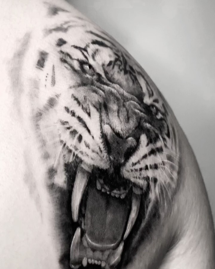 Tattoo by @digo_tattooer — black_and_grey, realism