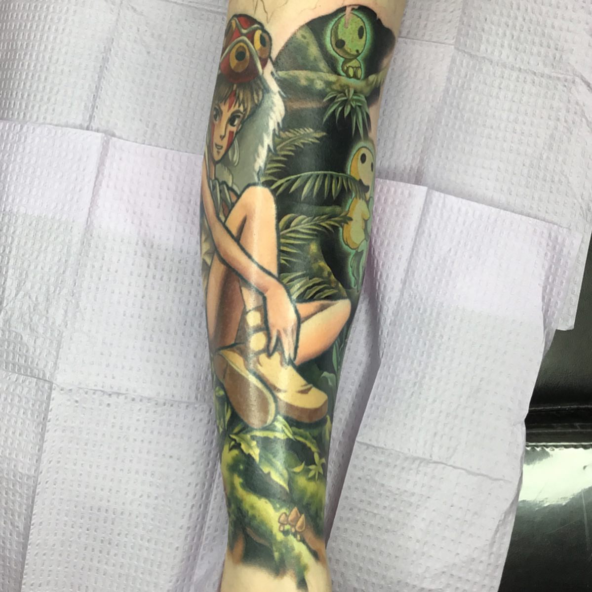 Forest scene with girl and owl dotwork tattoo on the forearm by Ariel Robinson