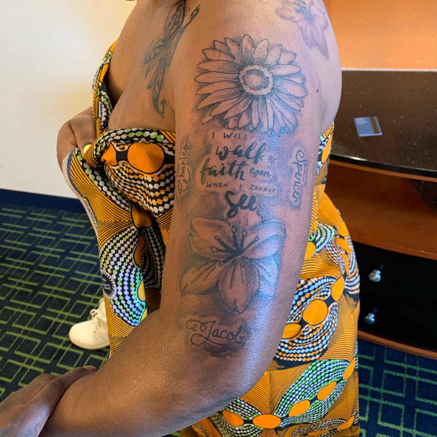 Flower and inspirational quote dotwork tattoo on the forearm by Deangelo Inkcrazy Dukes