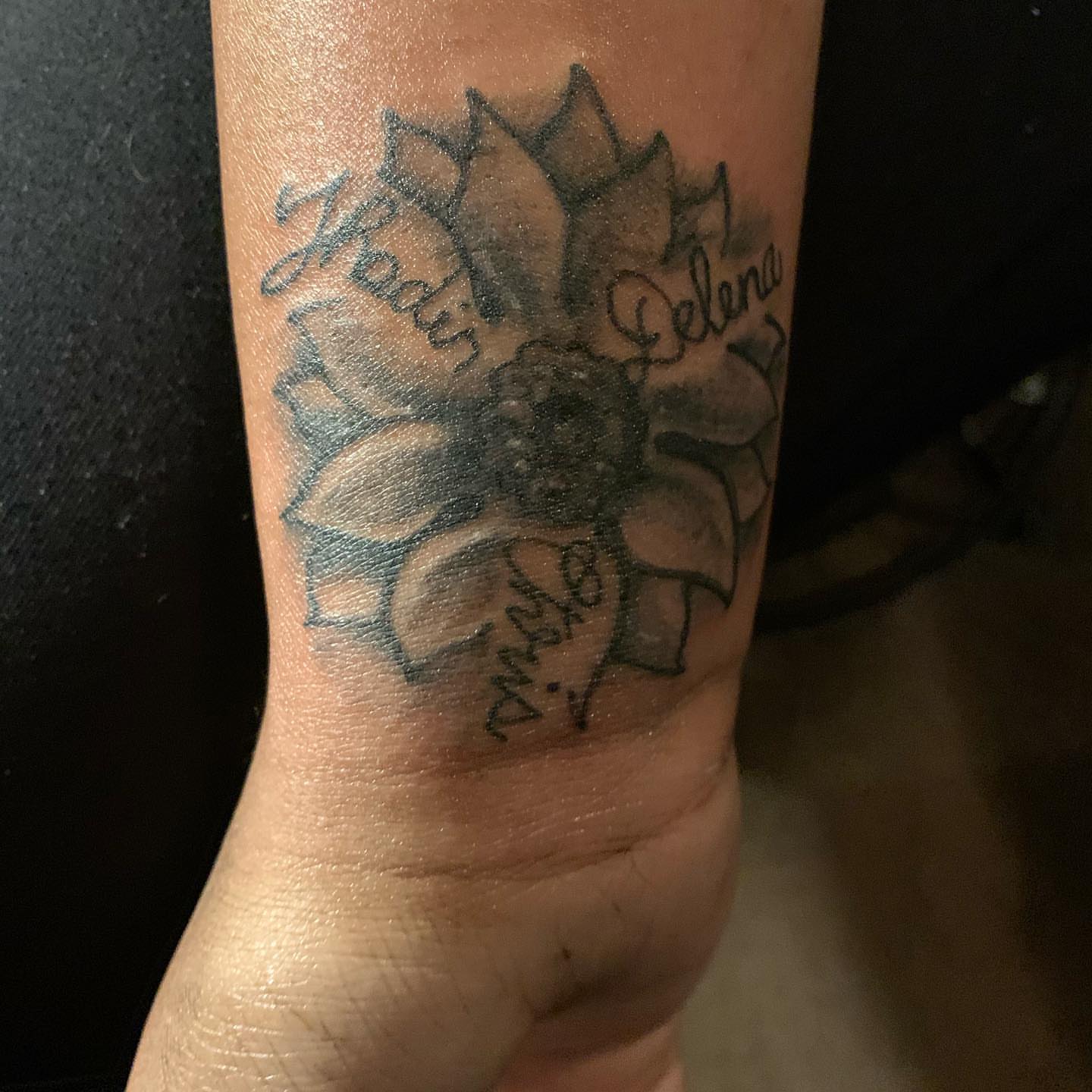 Sunflower black and grey tattoo on the forearm by Deangelo Inkcrazy Dukes