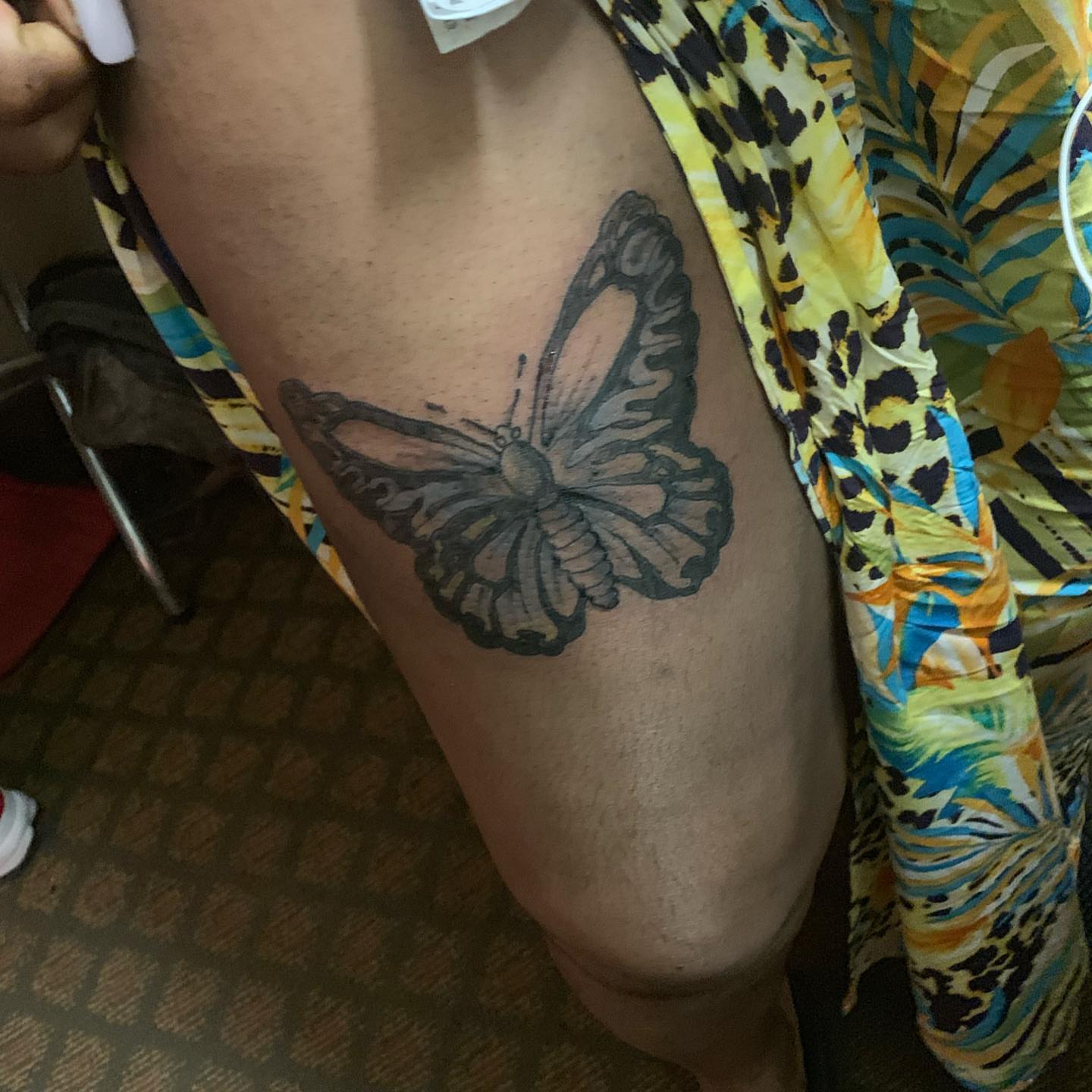 Butterfly black and grey tattoo on the thigh by Deangelo Inkcrazy Dukes