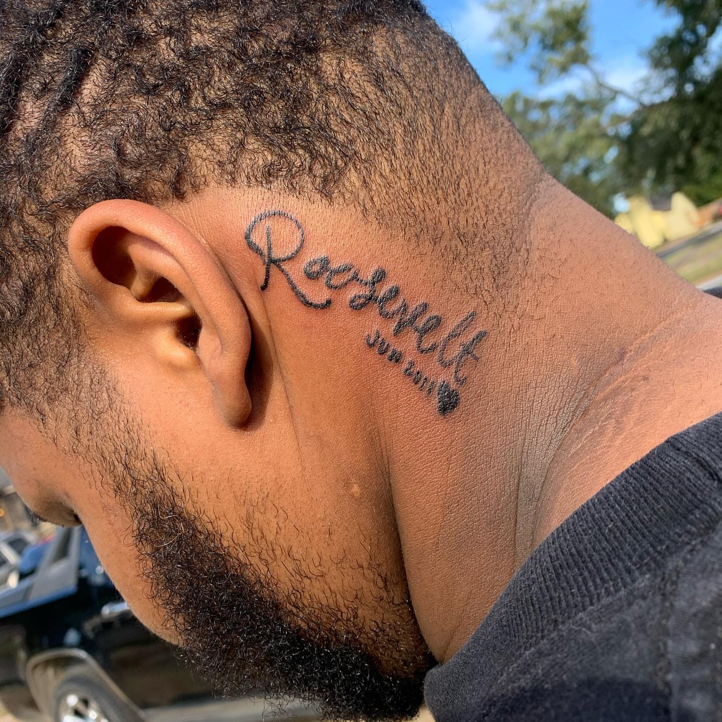 Roosevelt lettering script tattoo on the neck by Deangelo Inkcrazy Dukes