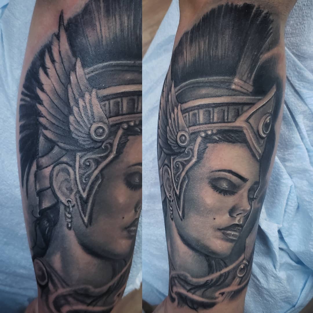 Woman with helmet realism tattoo on the forearm by Greg West Sac tattoo artist, West Sacramento, California