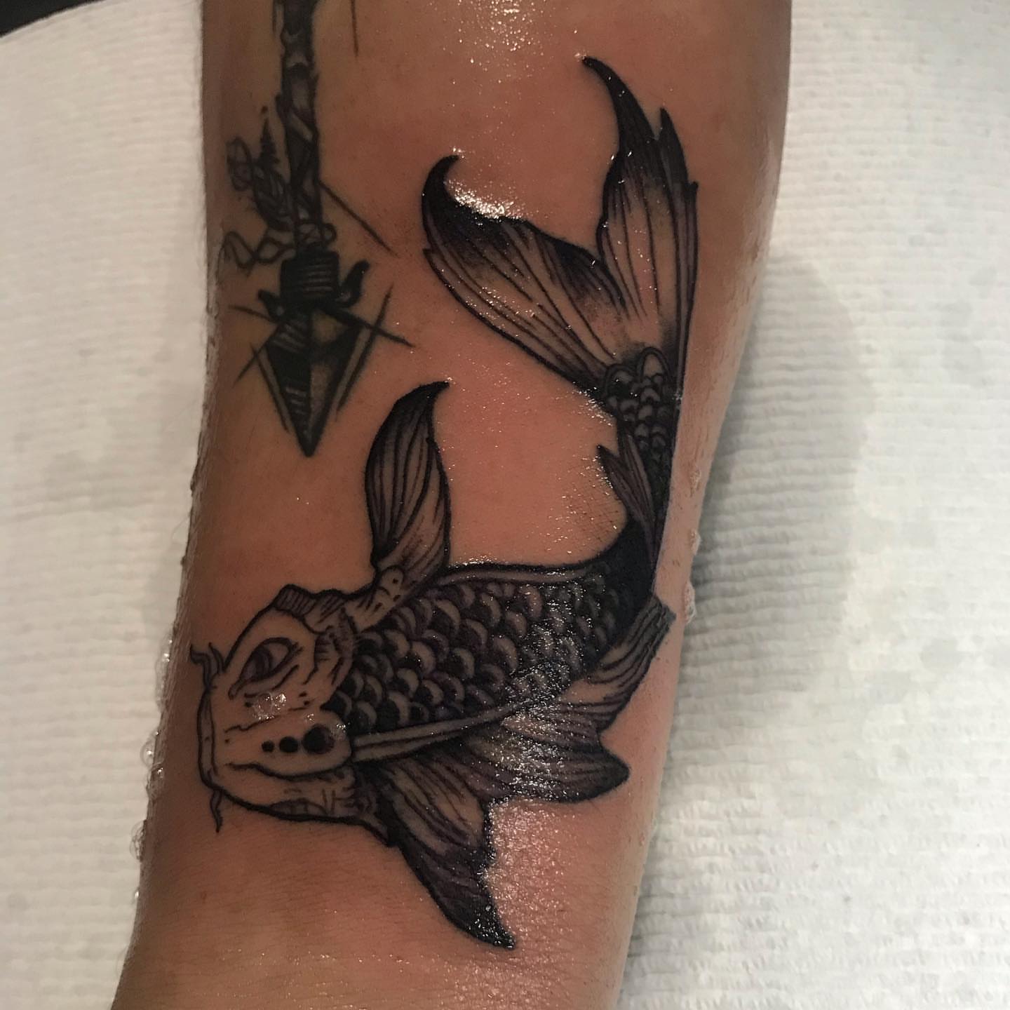 Koi fish black and grey tattoo on the forearm by Felix perez (Tattooer)