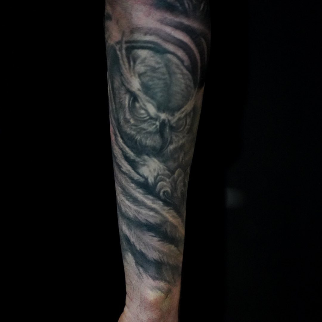 Owl realism tattoo on the forearm by Jeff Kees
