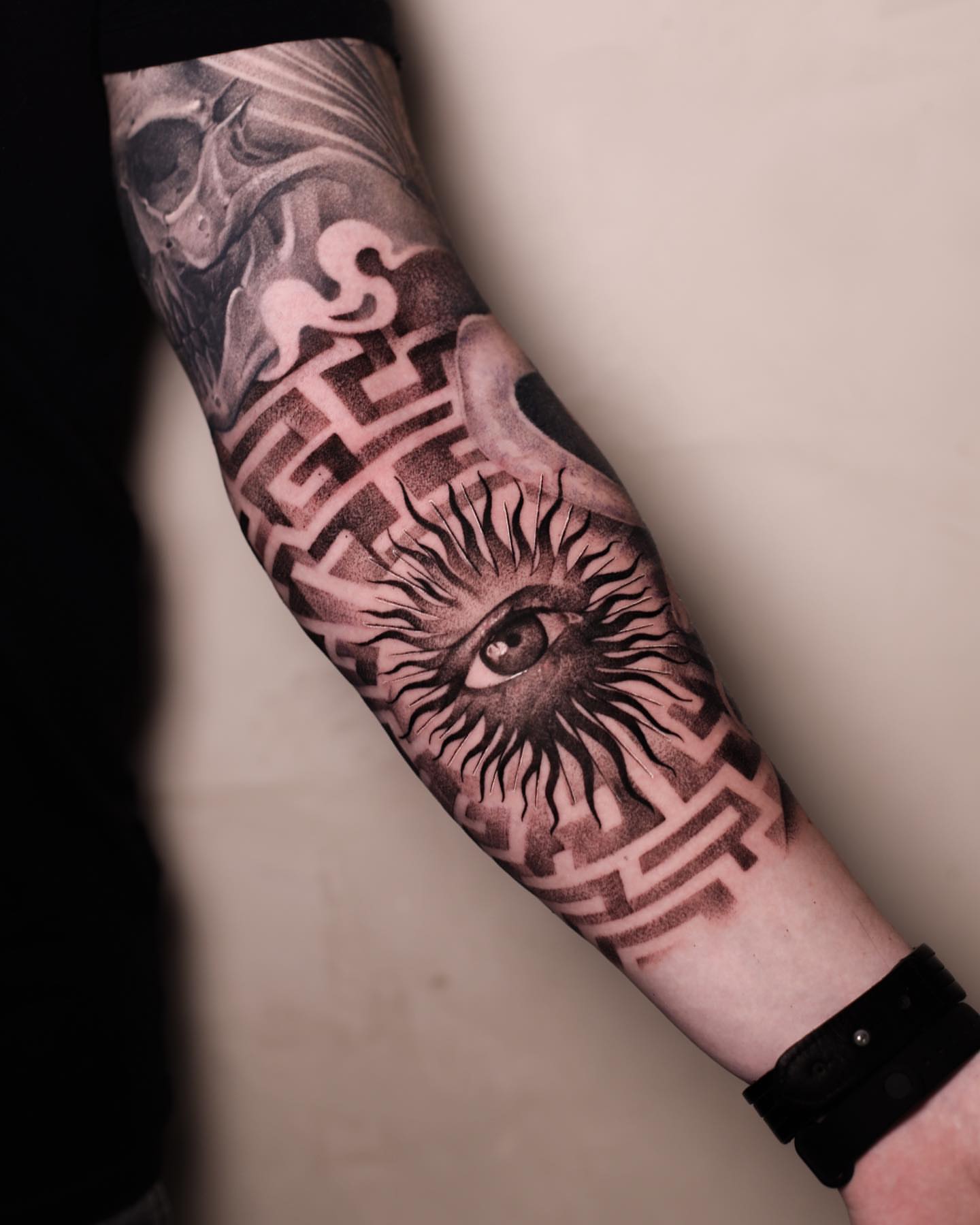 Eye and maze geometric tattoo on the forearm by Anna Chernova, San Francisco, California