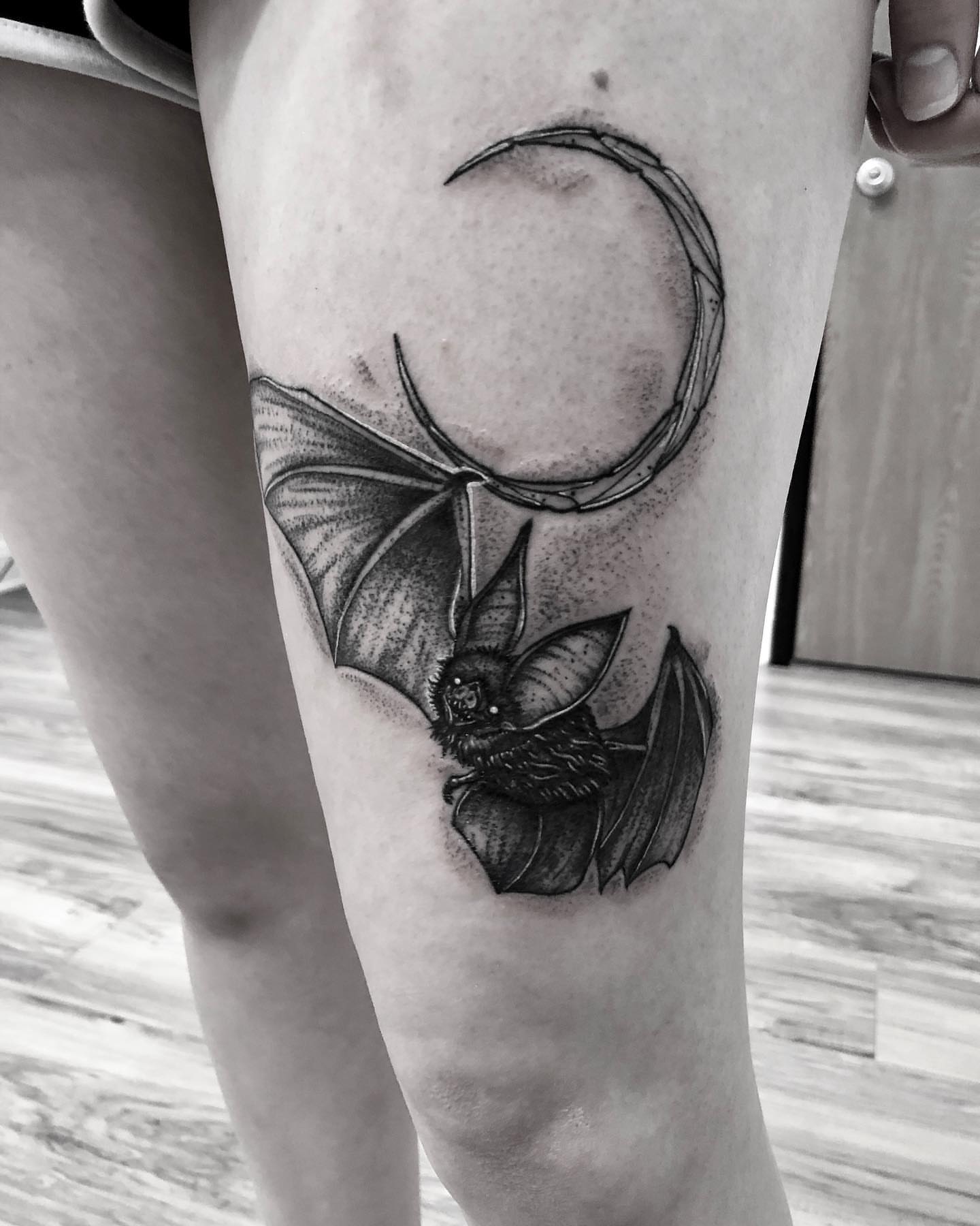 Bat and crescent moon dotwork tattoo on the forearm by Kody Miller Tattoos 📍Kansas City MO Tattoo, Kansas City, Missouri