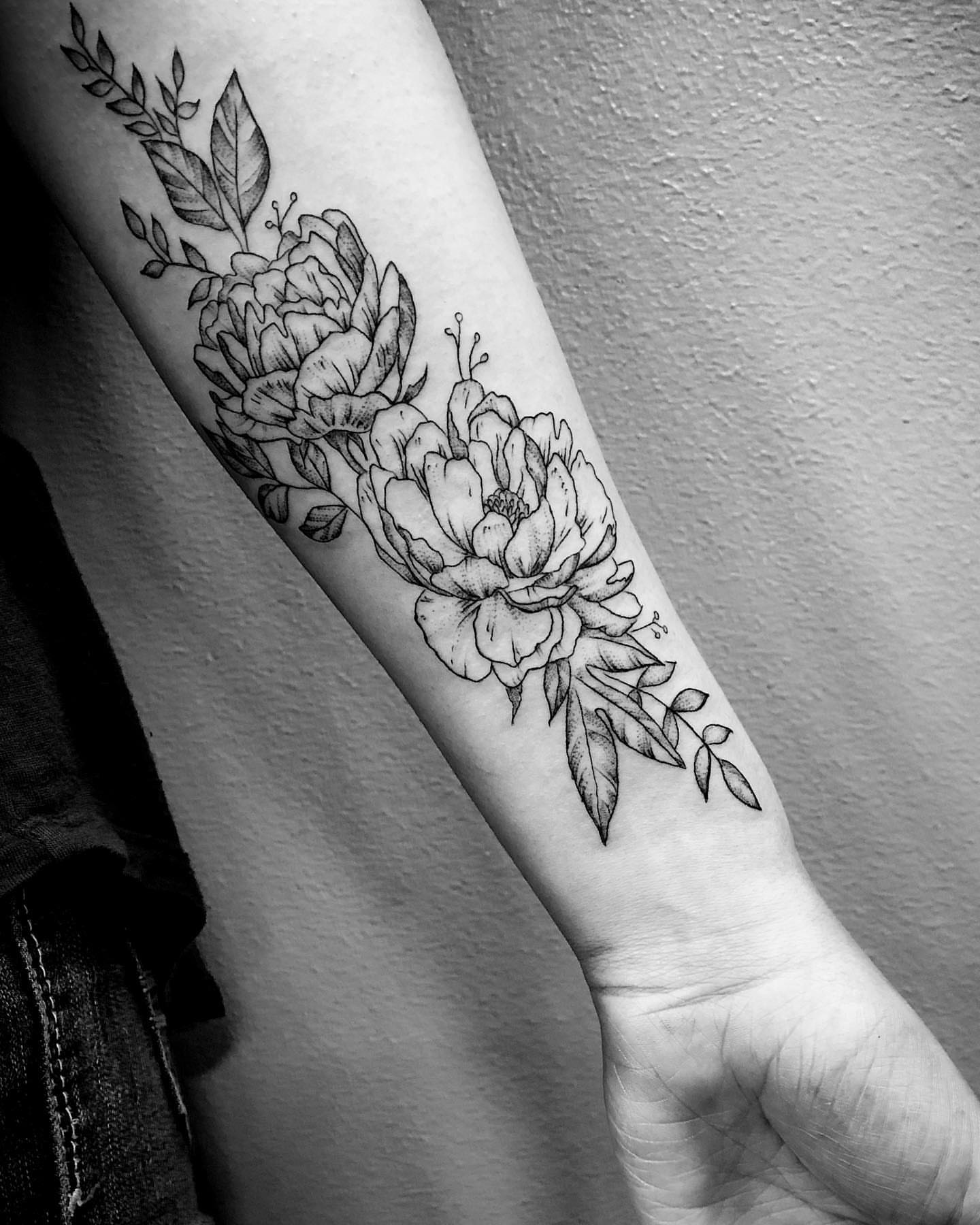 Peony flowers black and grey tattoo on the forearm by Thylacine Tattoo & Art, Los Angeles, California
