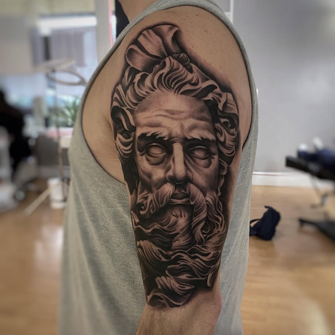 Tattoo by @_aaroncarey — realism, black_and_grey