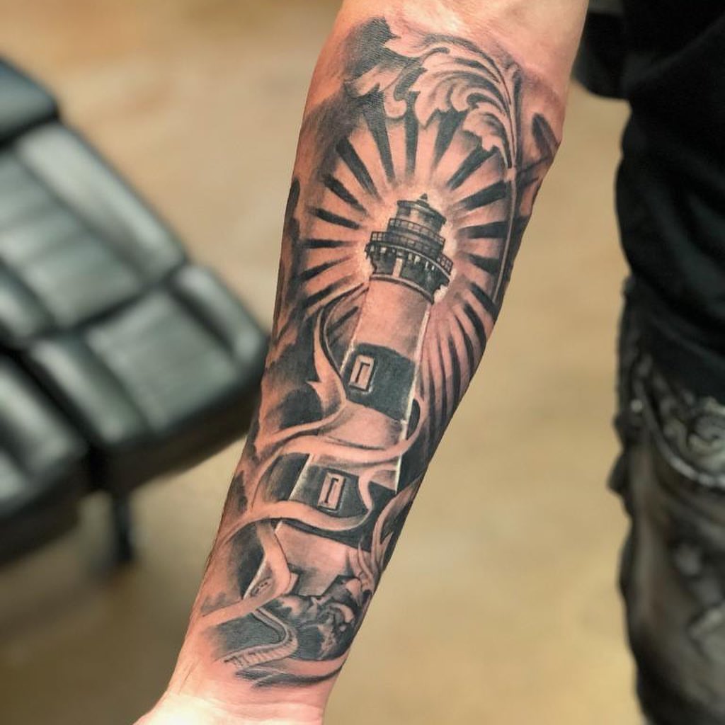 Lighthouse realism tattoo on the forearm by Mikeyftsk2