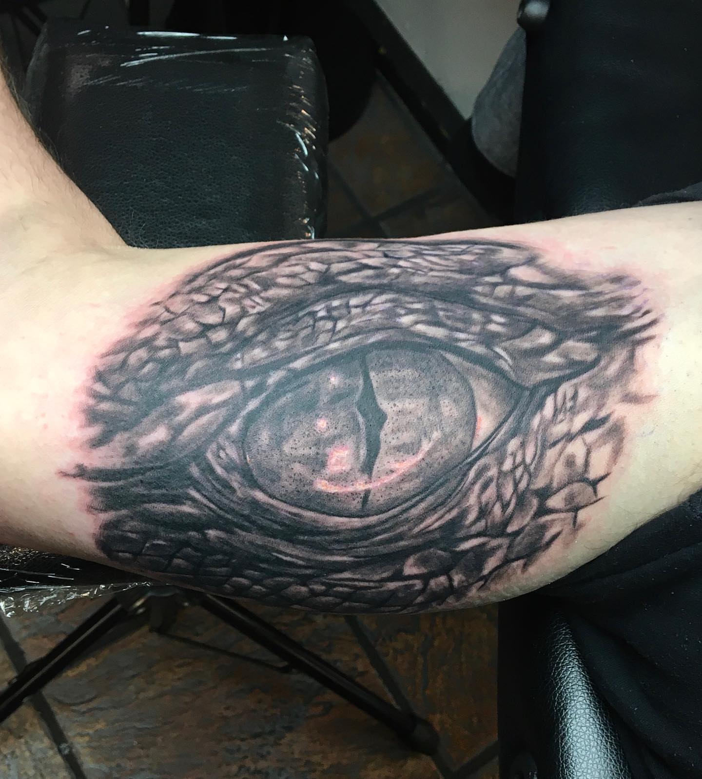 Eye realism tattoo on the forearm by Comfy Chris Fettig