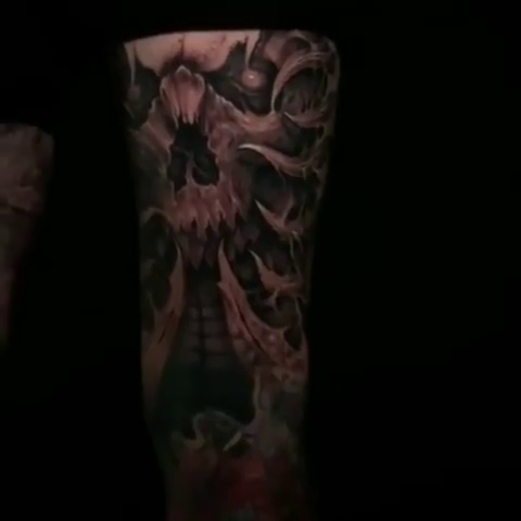 Skull and skeletal elements dark realism tattoo by Lindsay