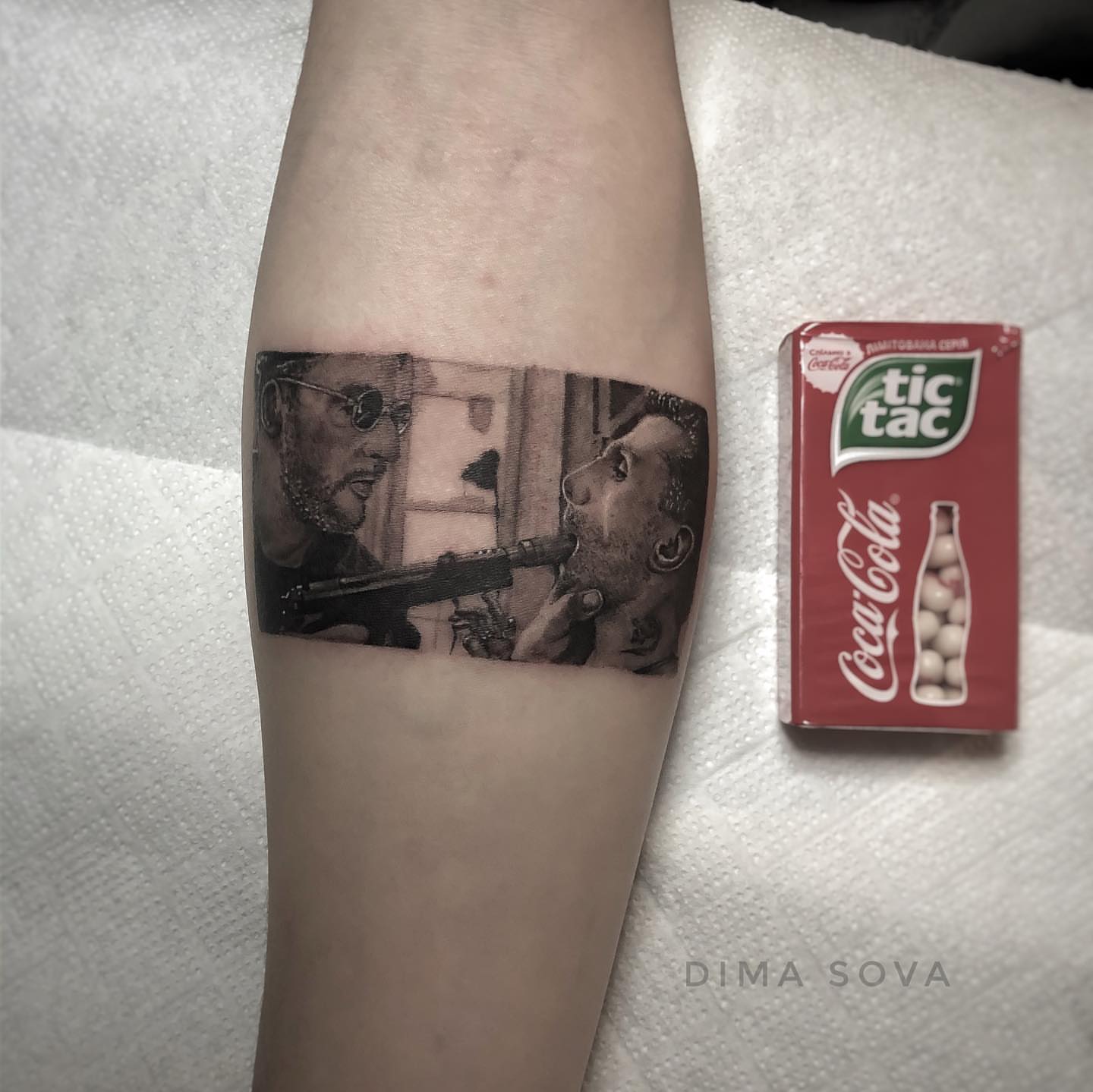 Gun and characters realism tattoo on the forearm by โ๏ธ Dima Sova โ๏ธ Tattoo ๐บ๐ธ Arlington VA