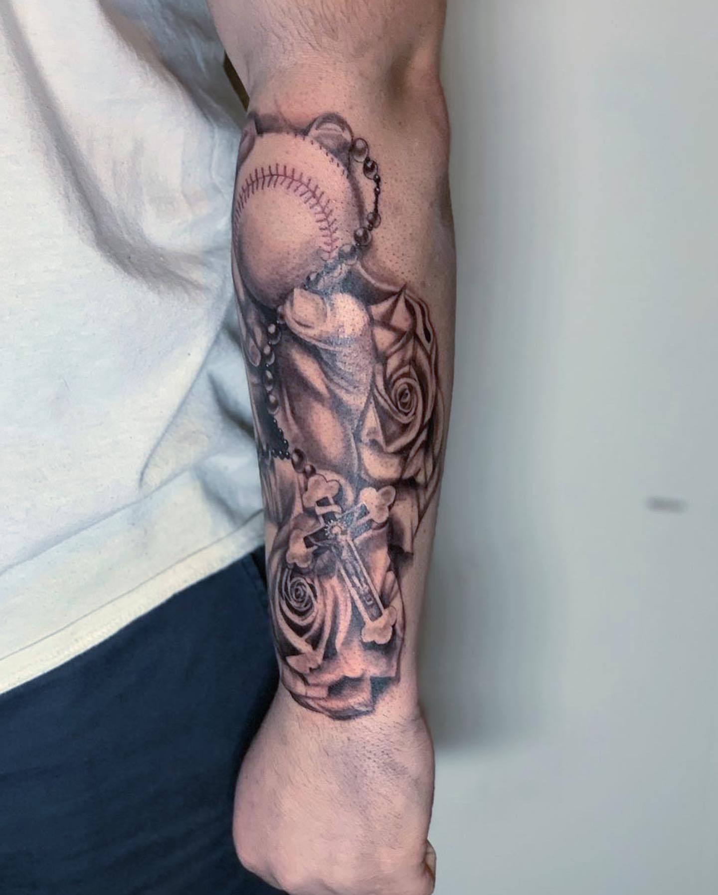 Baseball and rosary realism tattoo on the forearm by Nj Tattoo Artist Inkdyou, Bloomfield, New Jersey