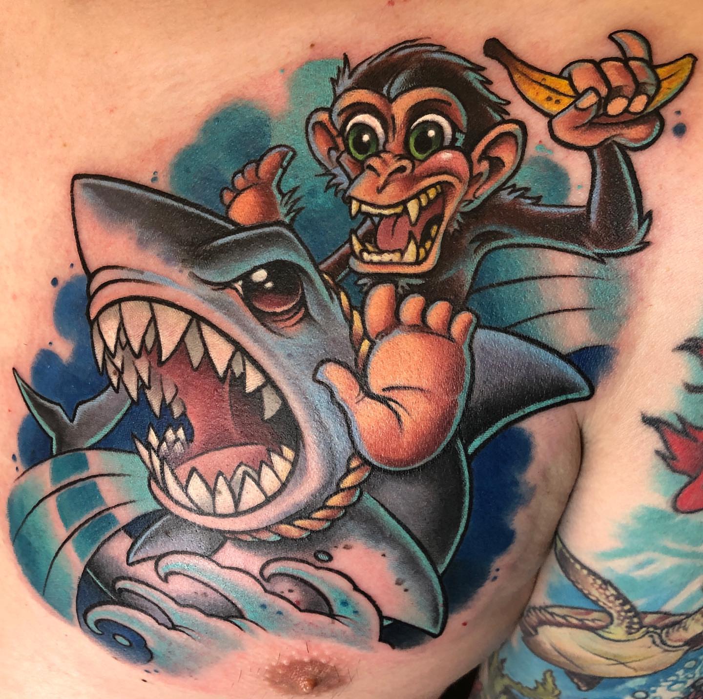 Monkey and shark American traditional tattoo on the torso by Walter Frank