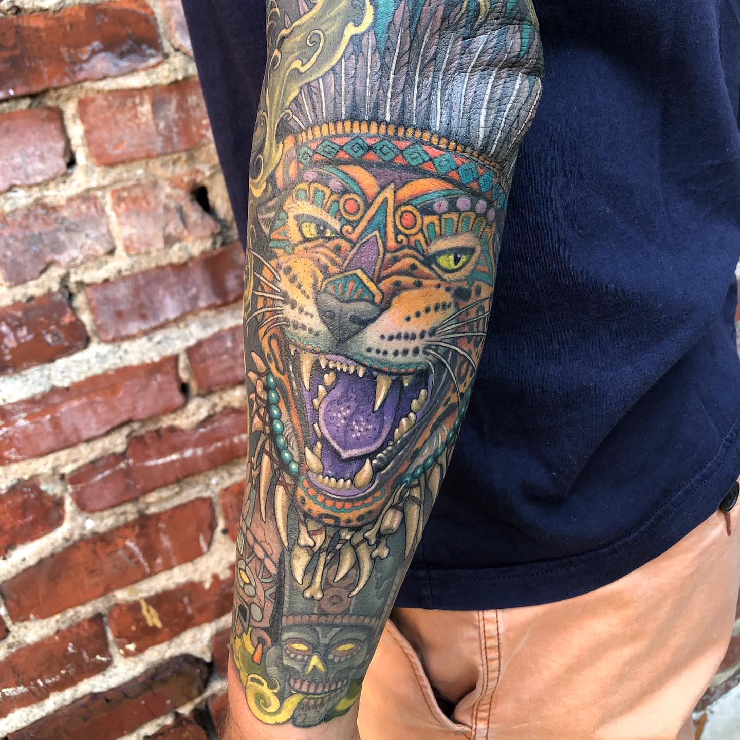 Jaguar dotwork tattoo on the forearm by Erin Chance