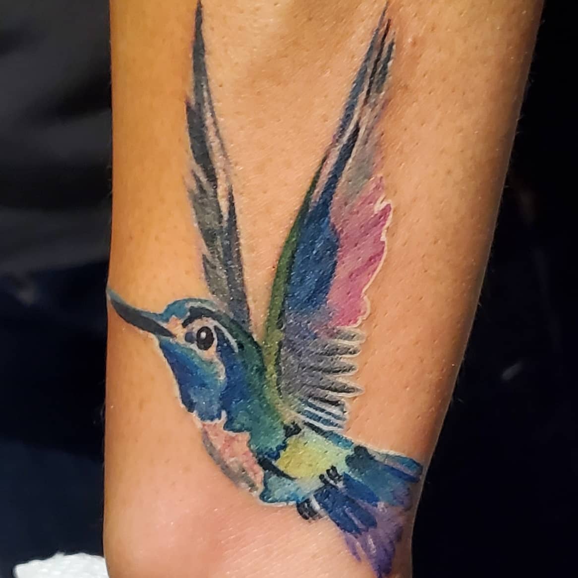 Tattoo by @jonnyriostattoo — watercolor
