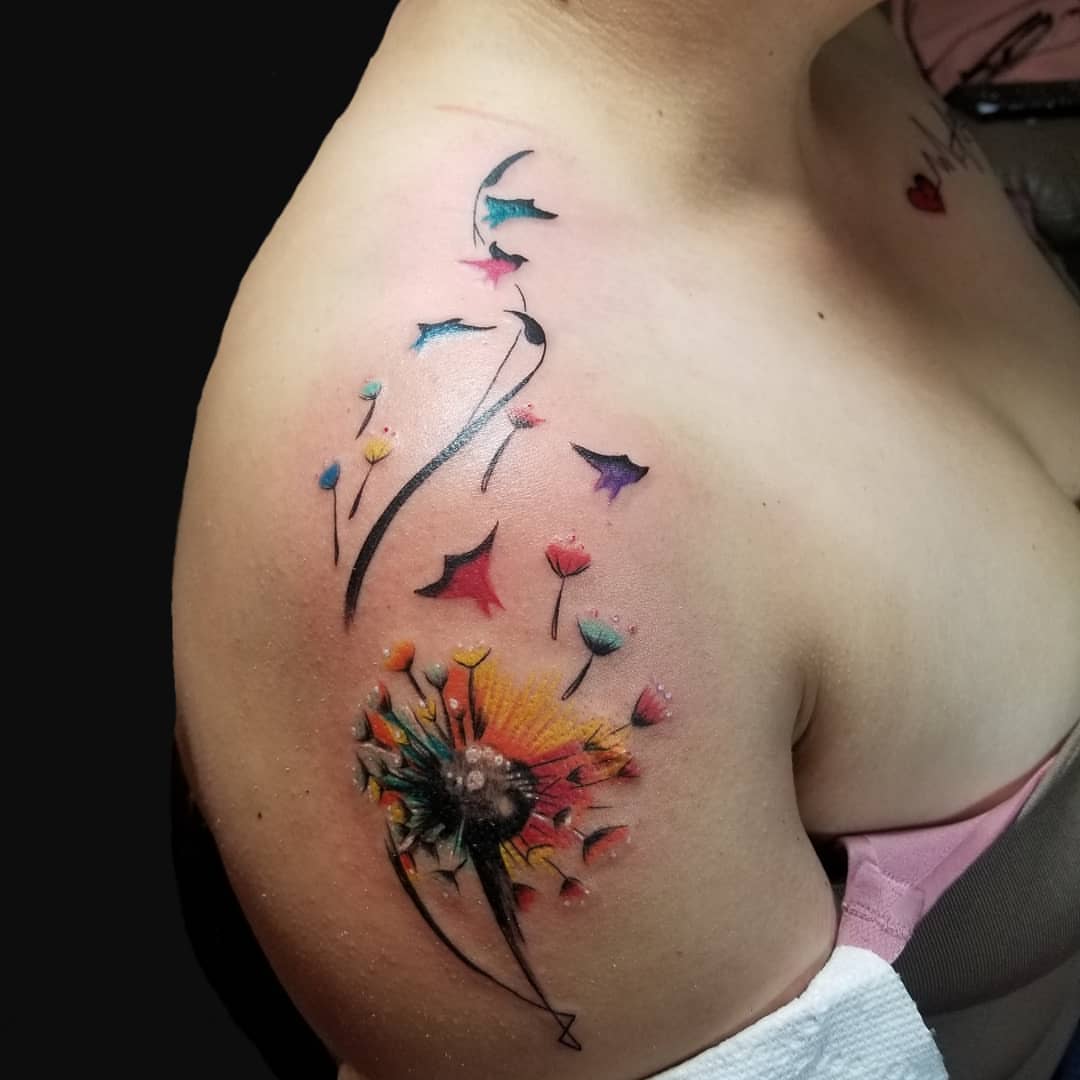 Dandelion seeds watercolor tattoo on the shoulder by Miguel-C, Houston, Texas