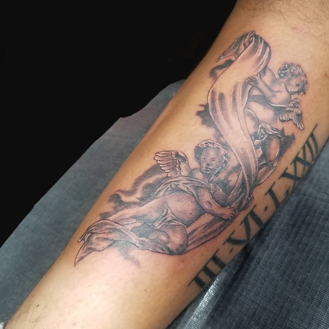 Cherubs black and grey tattoo on the forearm by Miguel-C, Houston, Texas
