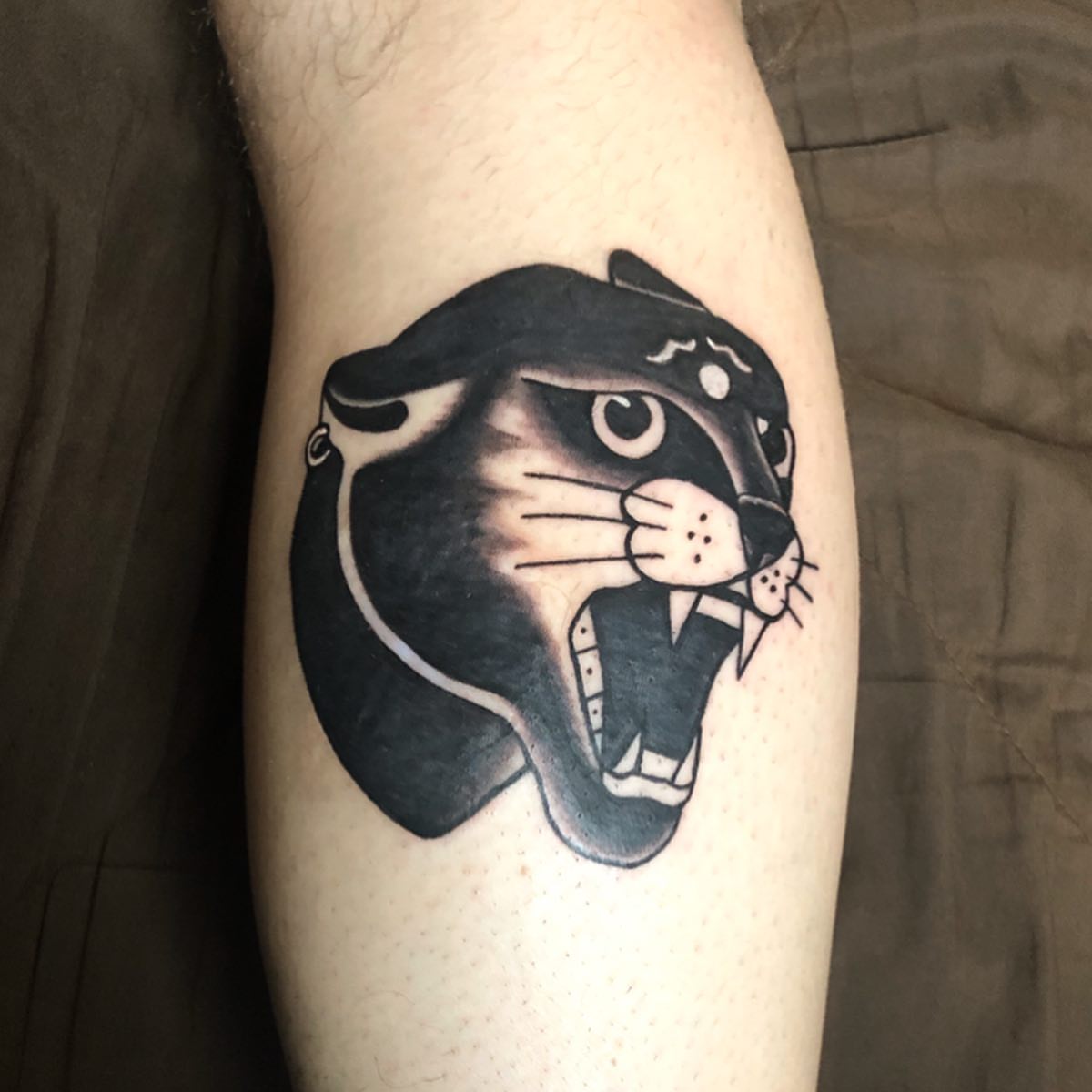 Panther black and grey tattoo on the forearm by Tattoo Artist ⚔️ San Diego, CA