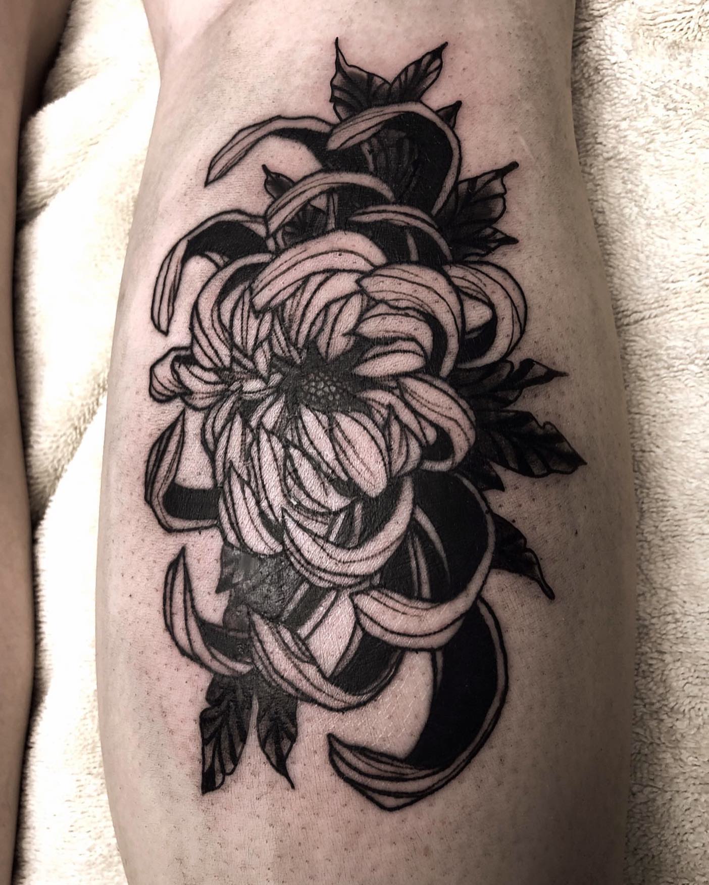 Chrysanthemum black and grey tattoo on the forearm by Tattoo Artist ⚔️ San Diego, CA