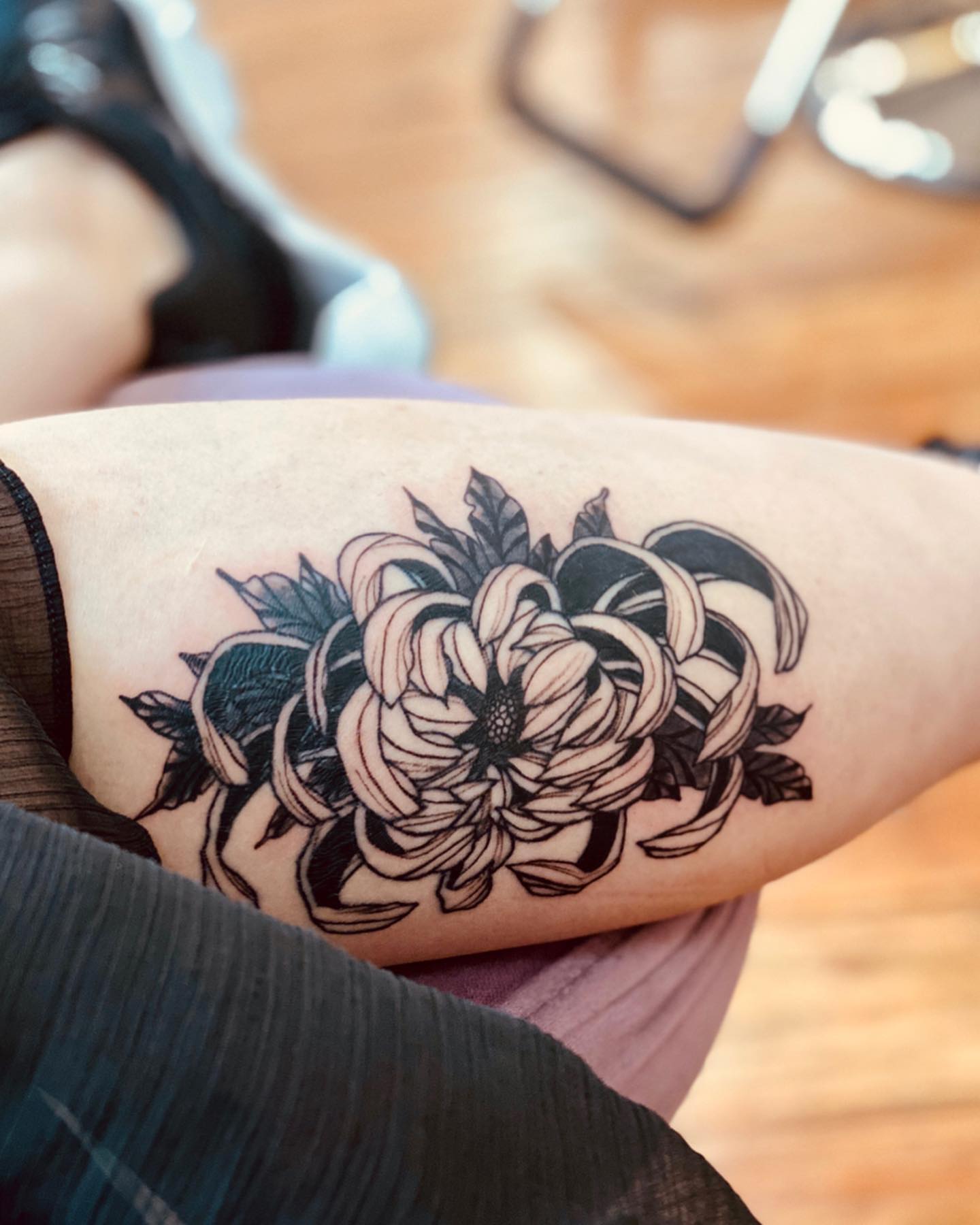 Chrysanthemum black and grey tattoo on the forearm by Tattoo Artist ⚔️ San Diego, CA