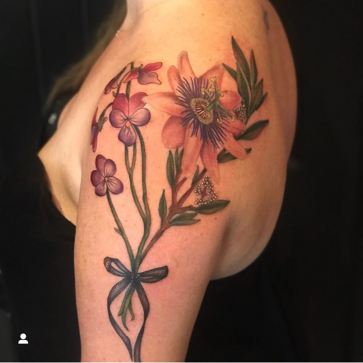 Floral bouquet realism tattoo on the shoulder by 𝓚𝓪𝓼𝓼𝓪𝓷𝓭𝓻𝓪 𝓜𝓬𝓒𝓪𝓵𝓵, Eugene, Oregon