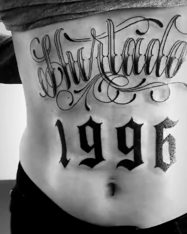 Burlado 1996 lettering script tattoo by Bree Quirino