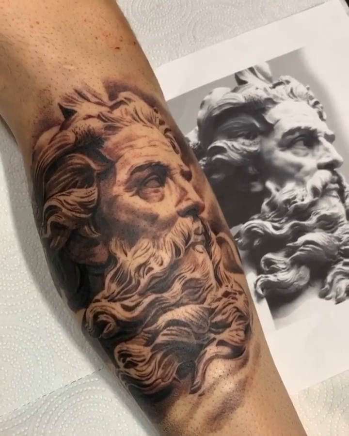 Bust of Zeus realism tattoo by BJ
