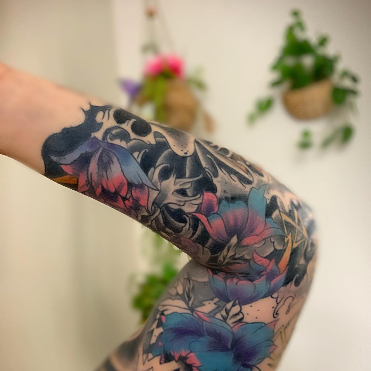 Floral bouquet new school tattoo on the forearm by Dre Inks