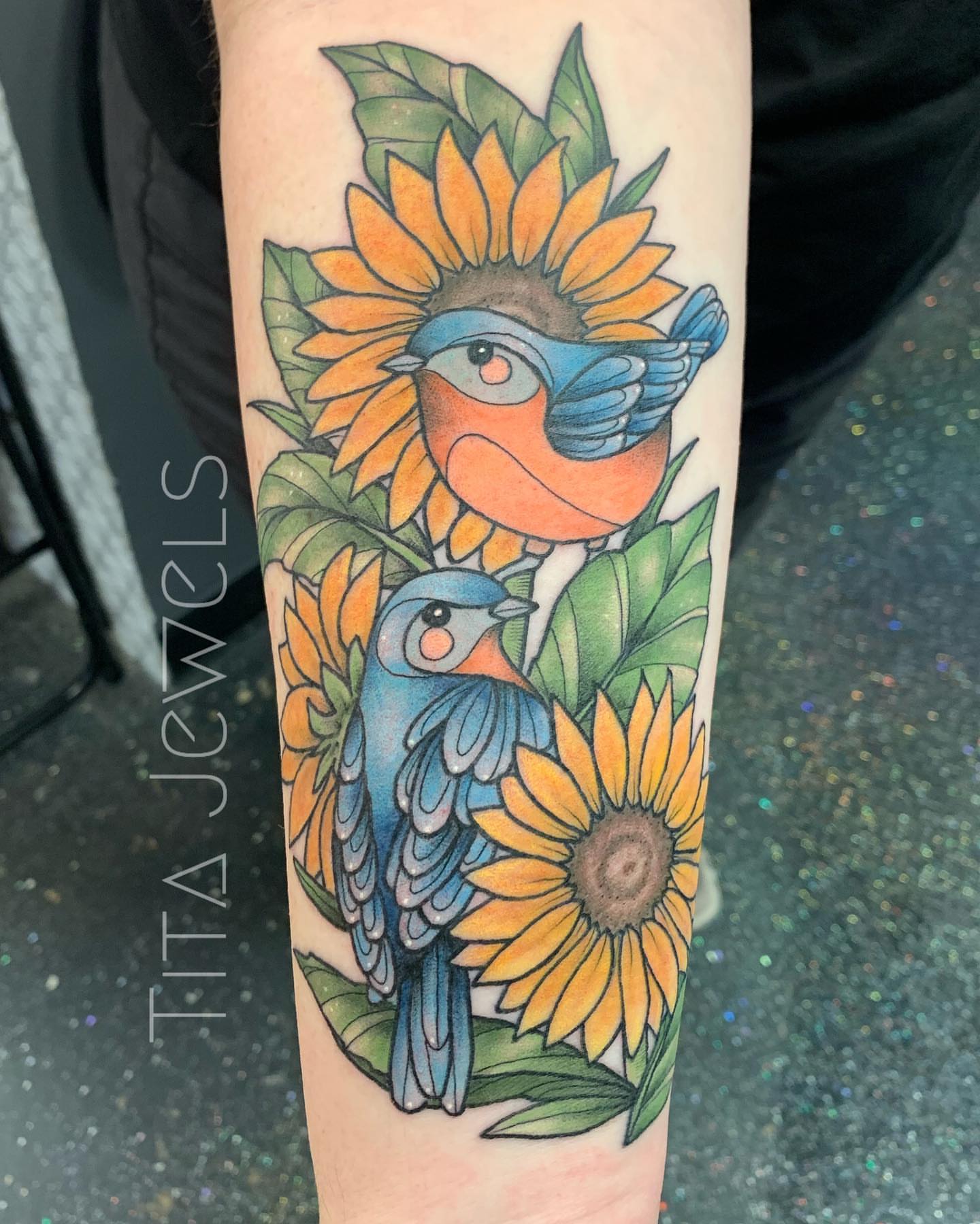 Sunflowers and birds new school tattoo on the forearm by Tita Jewels- Tattoo Artist, Austin, Texas