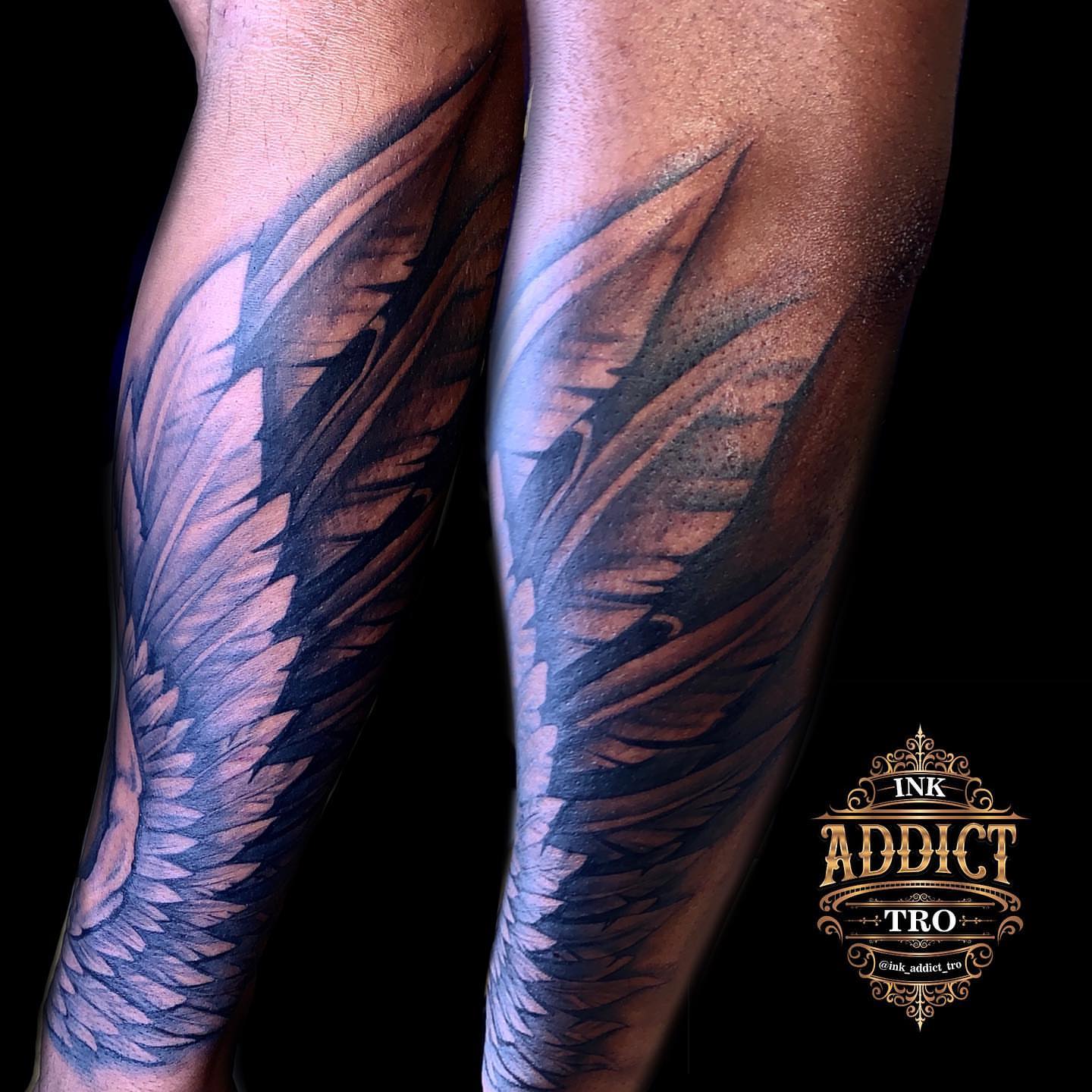 Wings black and grey tattoo on the forearm by Trocon Talhouk