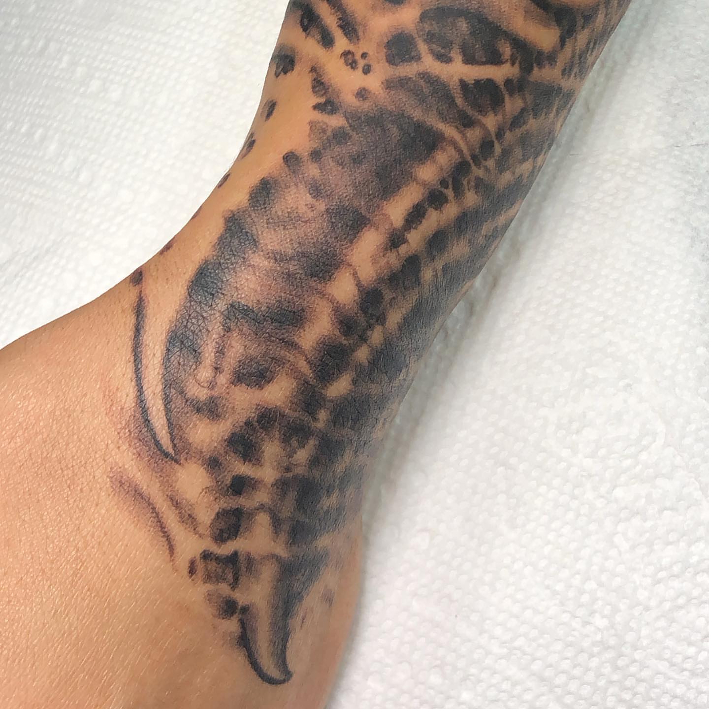 Geometric pattern geometric tattoo on the forearm by Shaine Smith, Durham, North Carolina