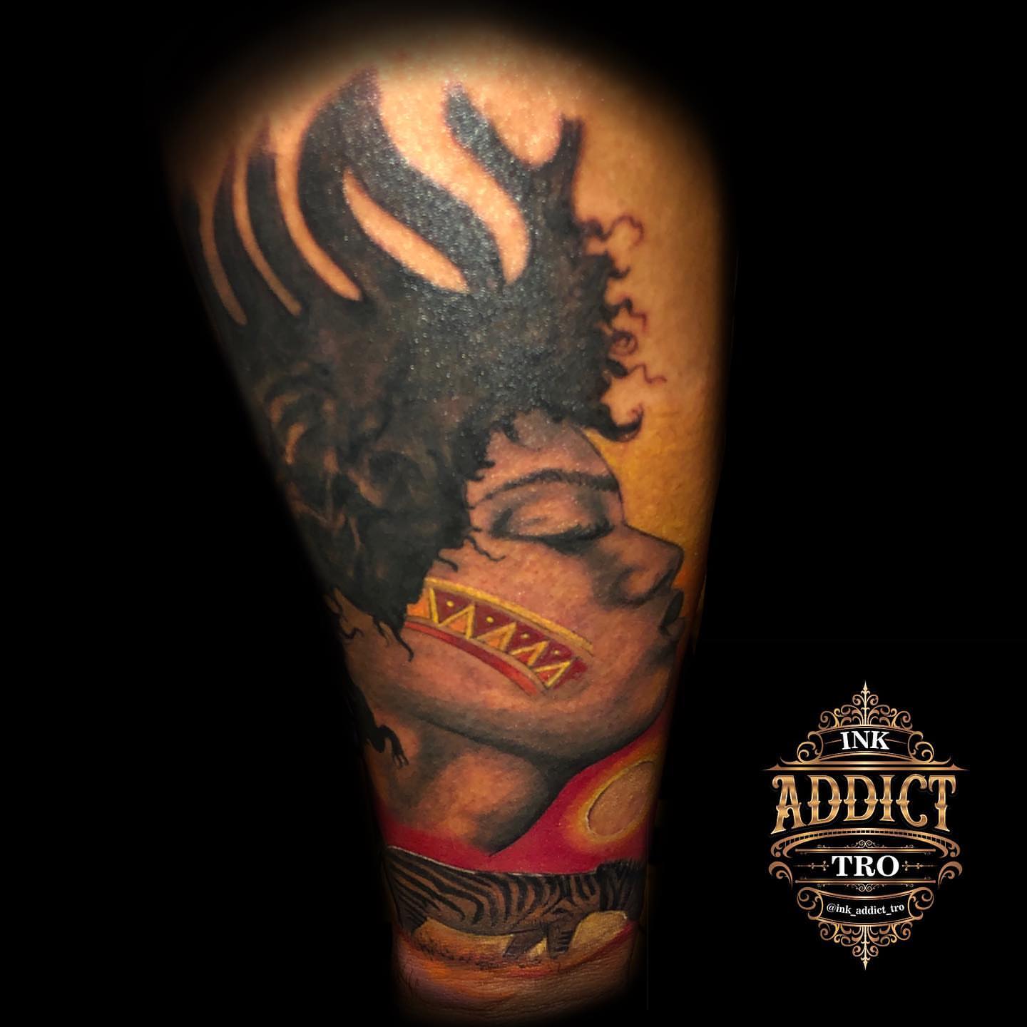Woman with afro realism tattoo on the forearm by Trocon Talhouk