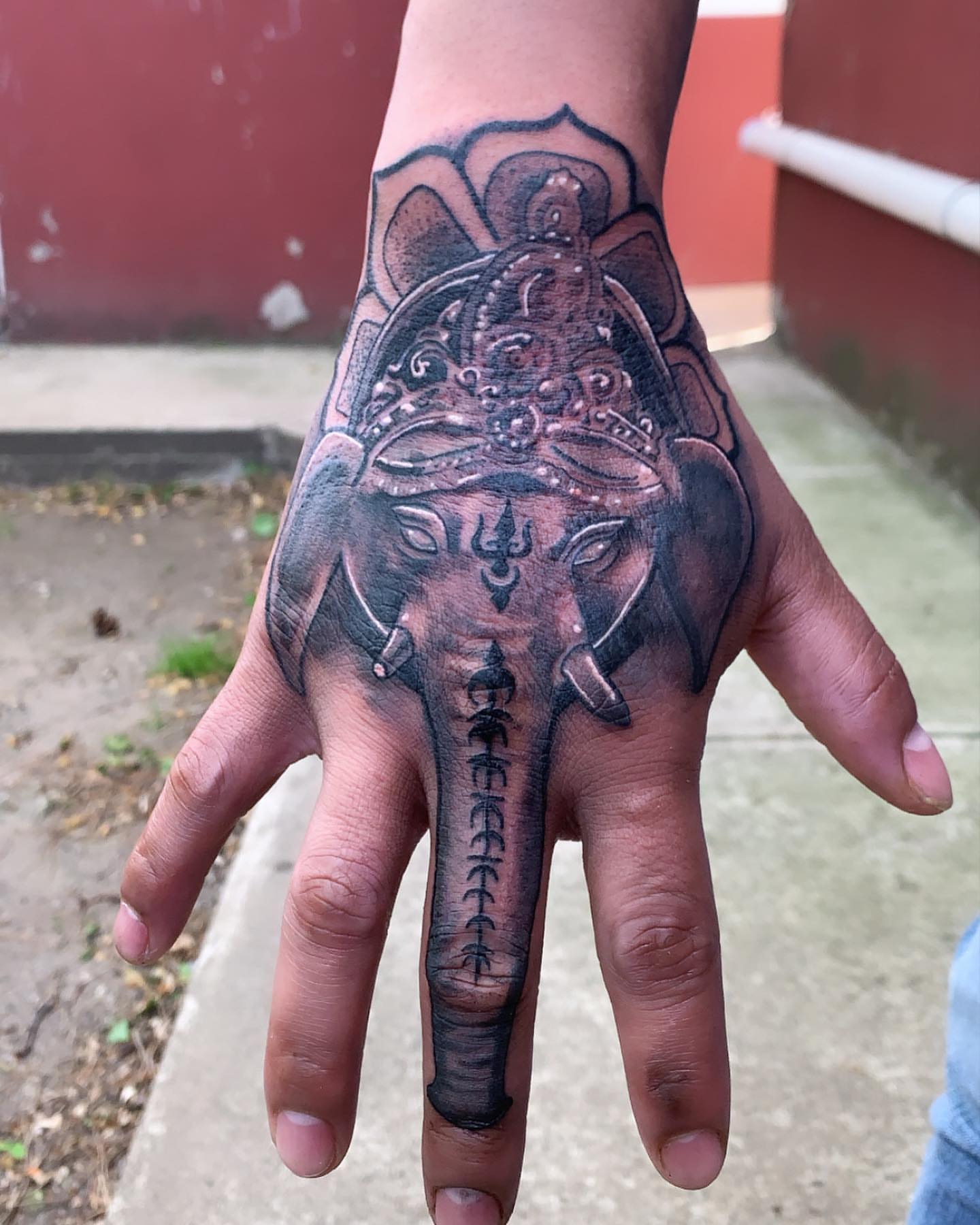 Elephant head black and grey tattoo on the hand by TattoozbyAlexander