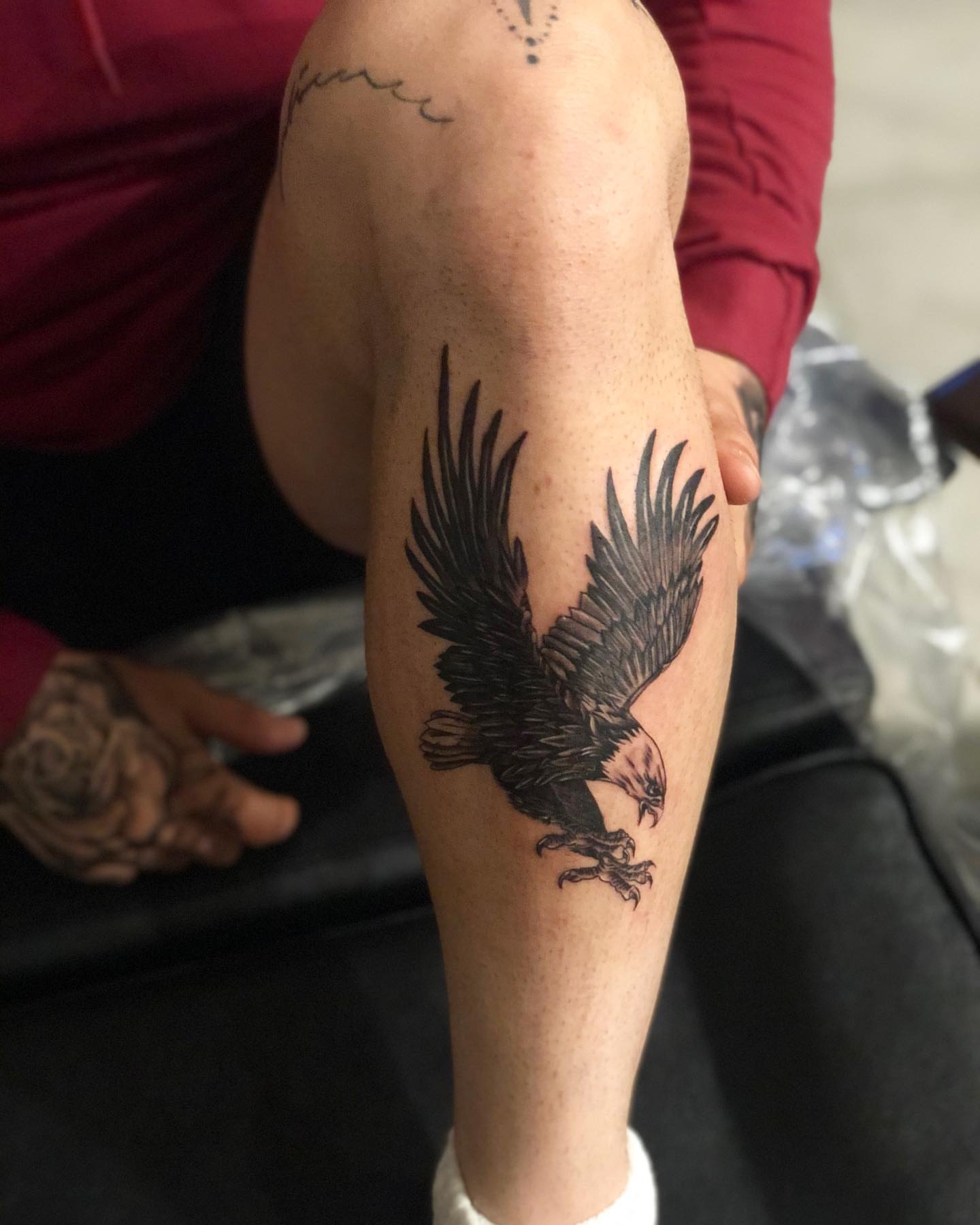 Eagle black and grey tattoo on the forearm by Kevin Palma